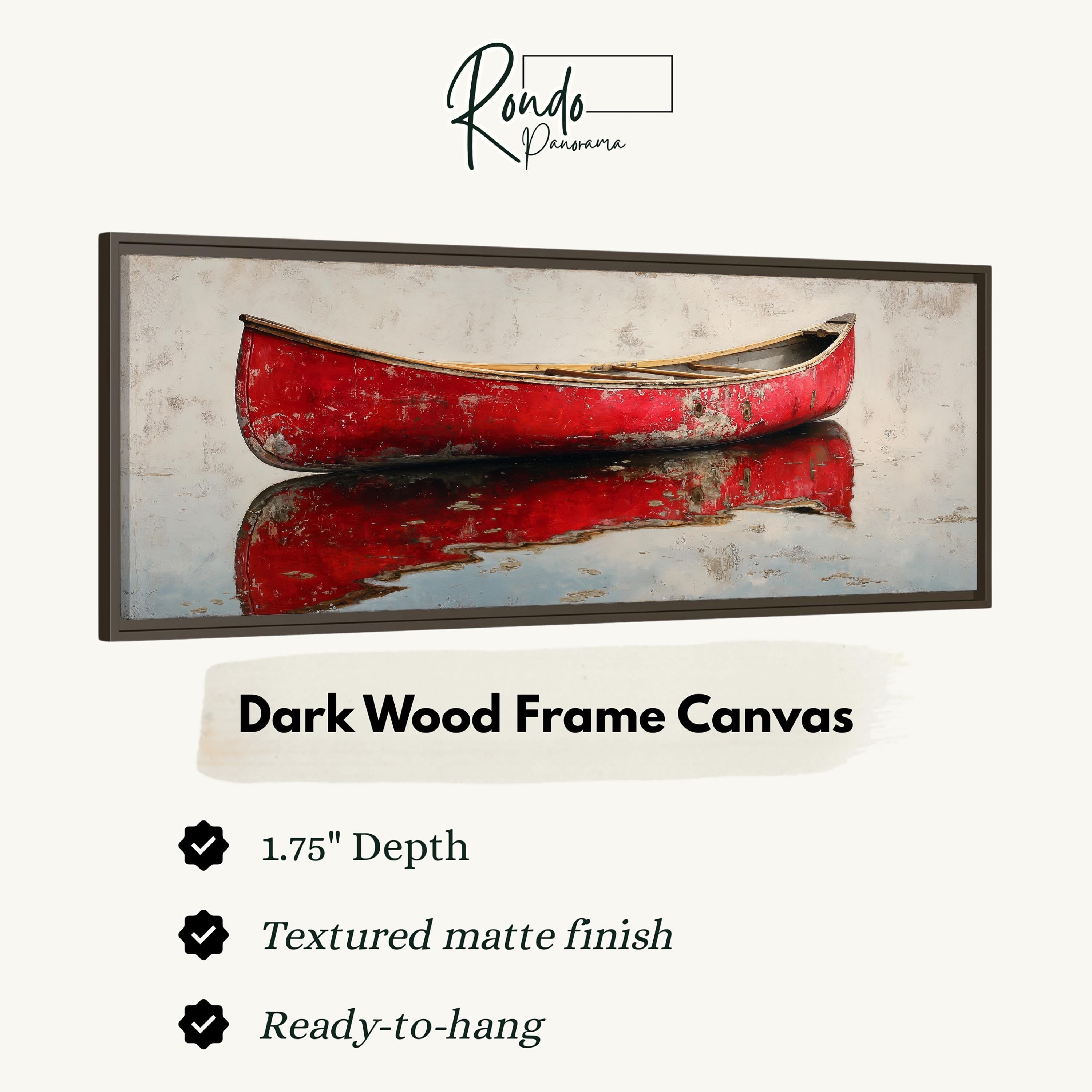 a red canoe on a reflective surface, with a dark wood frame canvas hanging above it.