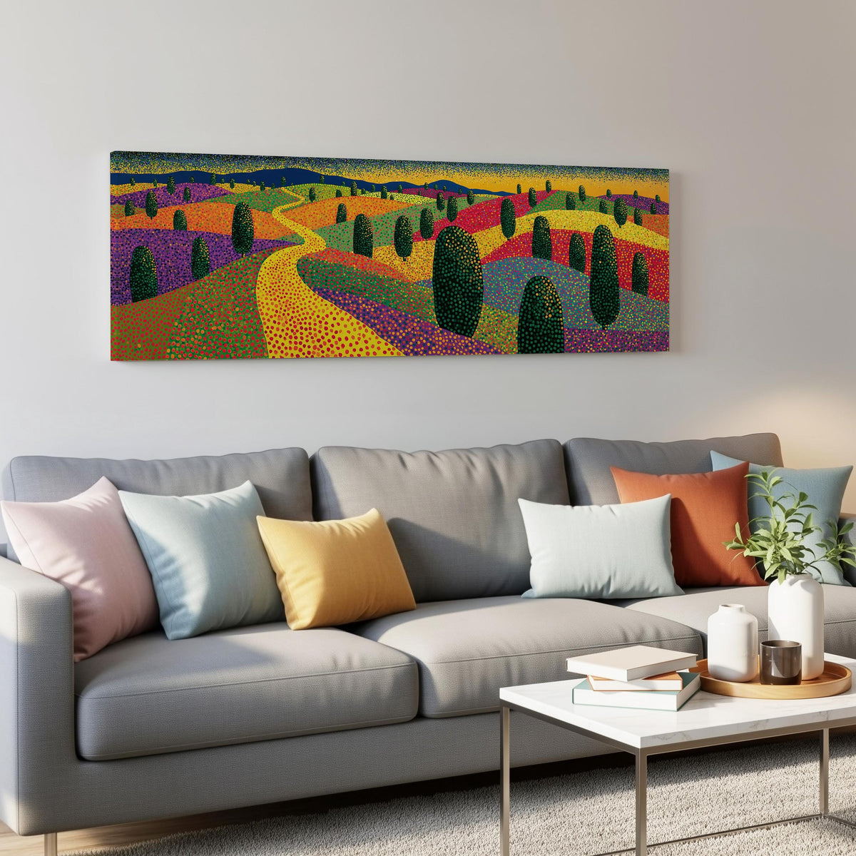 Colorful dotted garden with a winding path panoramic canvas print above a grey sofa in a living room