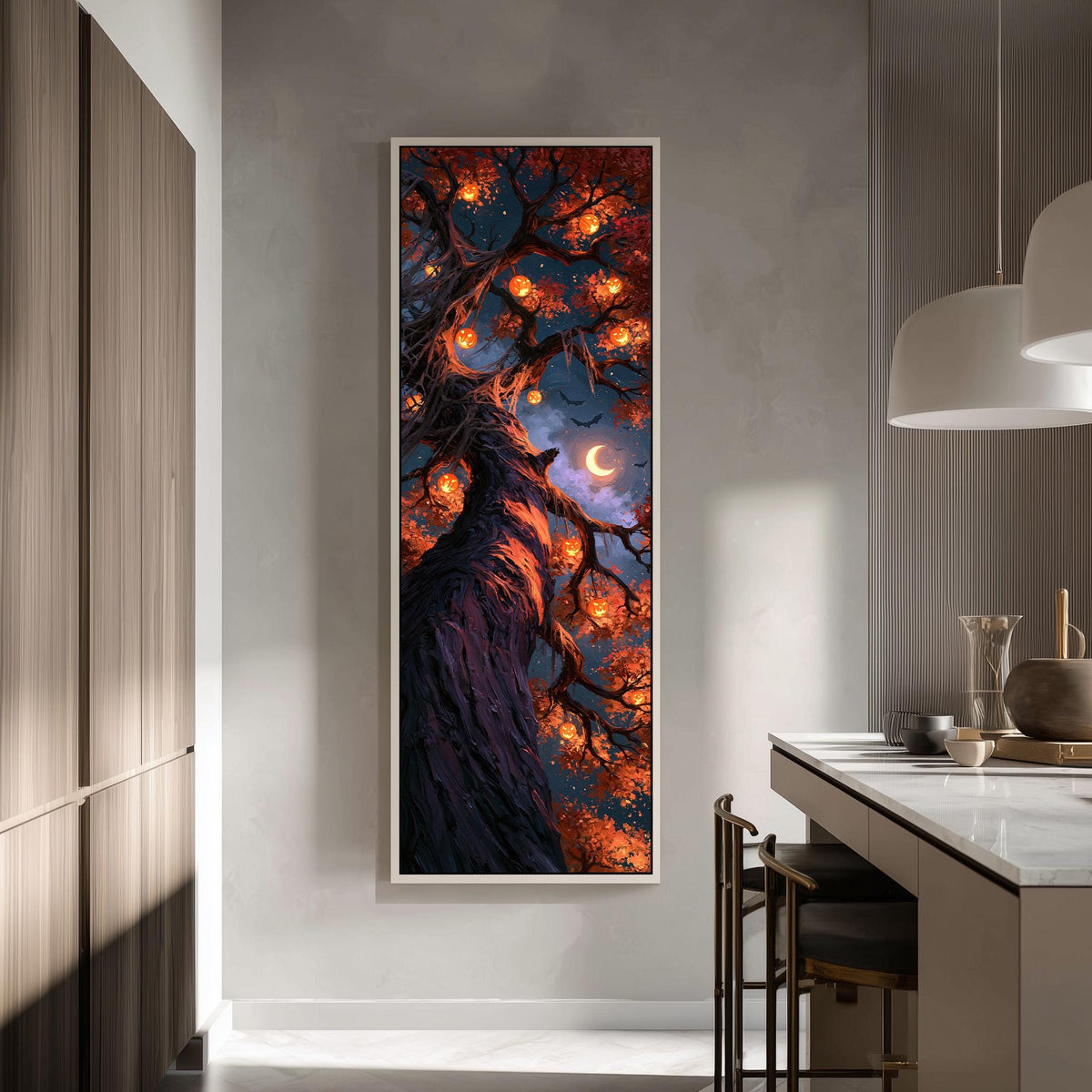 Twisted tree hung with glowing jack-o'-lanterns tall skinny canvas print in a modern kitchen