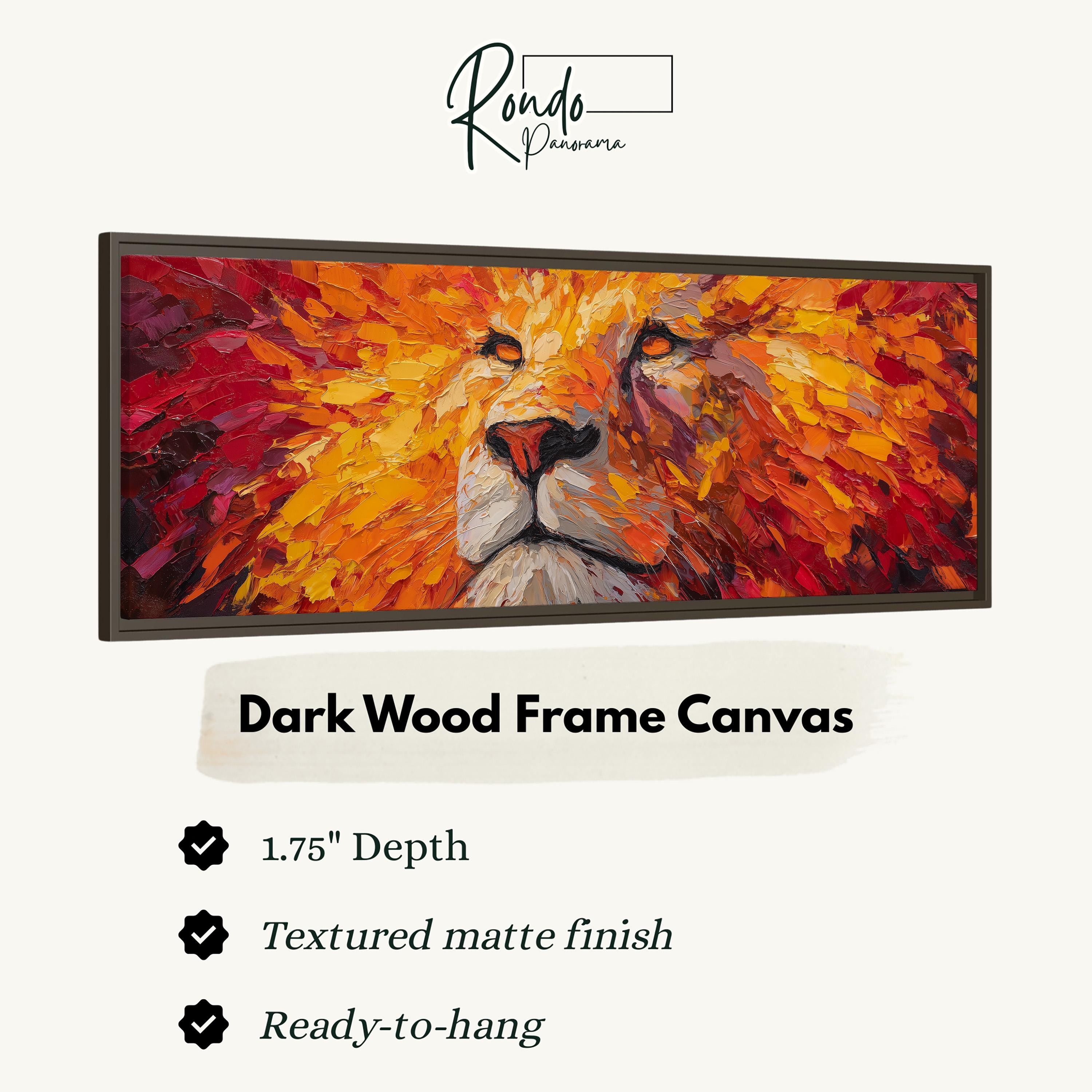 The image is a close-up of a framed artwork depicting a lion's face with vibrant orange and red hues.