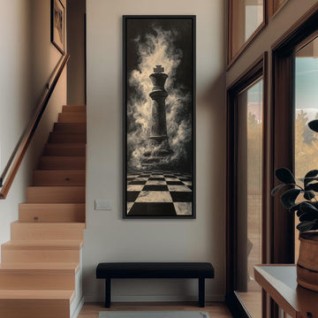 a large black and white painting of a chess king on the wall, with a checkerboard pattern below it. The painting is hanging above a black bench, which is positioned in front of a window. The room has wooden stairs leading up to the bench, and there is a plant on the windowsill.