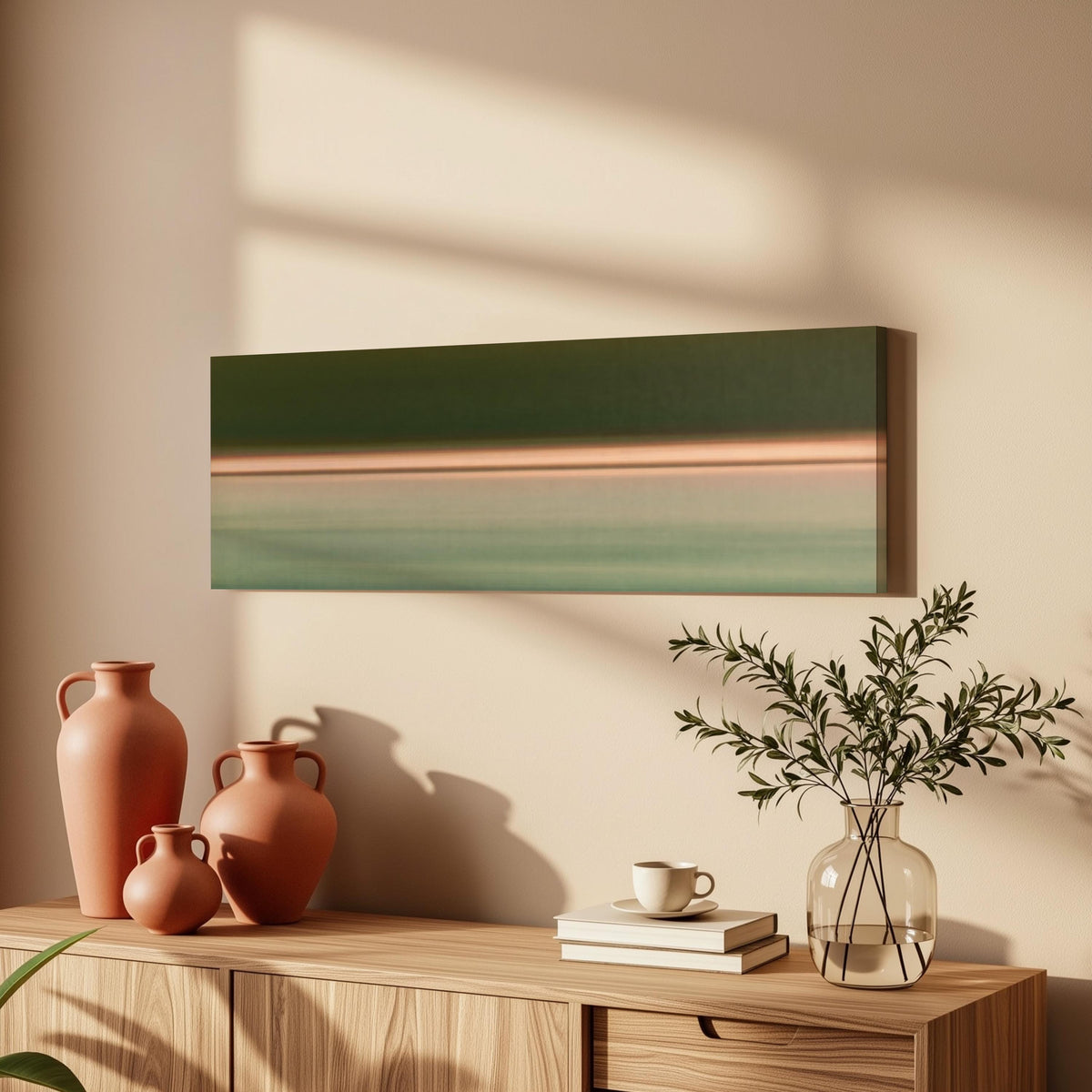 Minimalist dusk horizon gradient long horizontal canvas print above a wooden sideboard