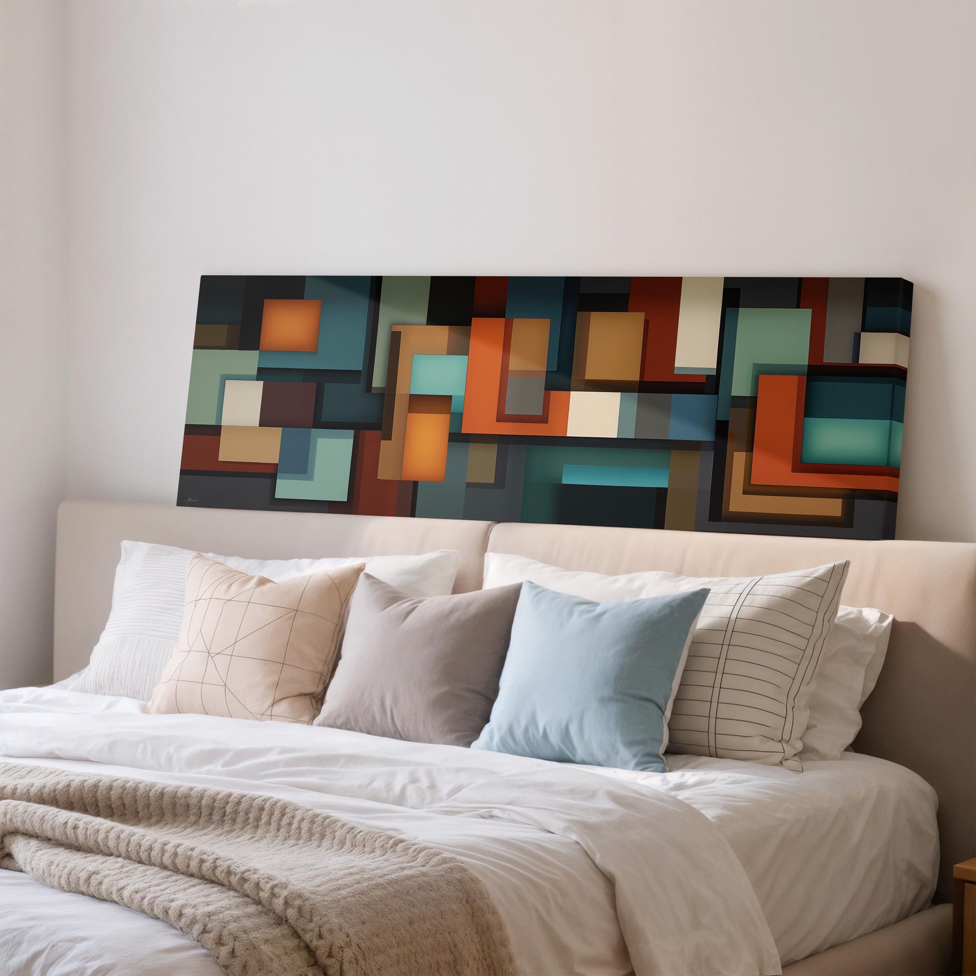 a large bed with a white comforter and a variety of colorful pillows. Above the bed, there is a large abstract painting or artwork displayed on the wall.