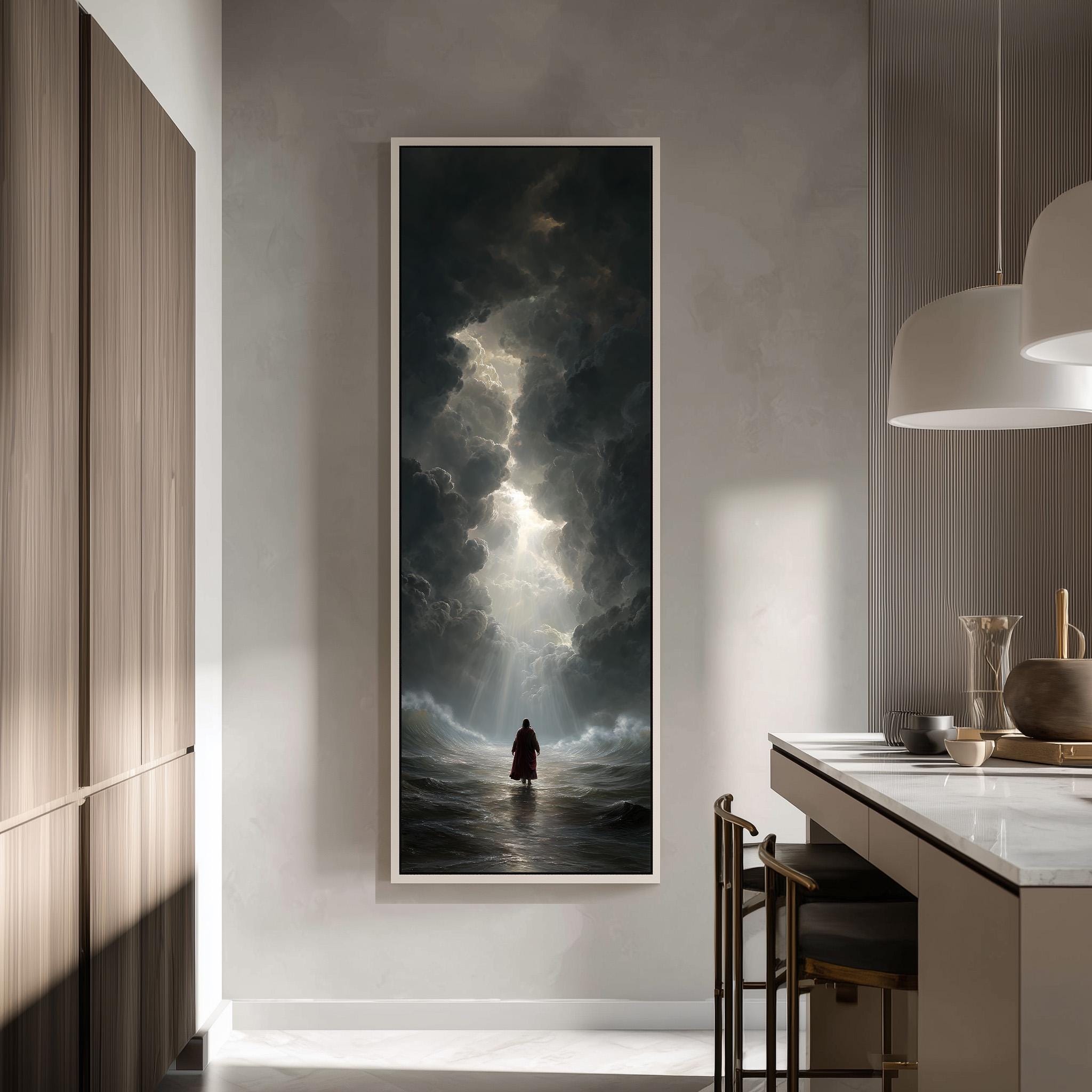 a person standing in a kitchen, looking out at a stormy sea.