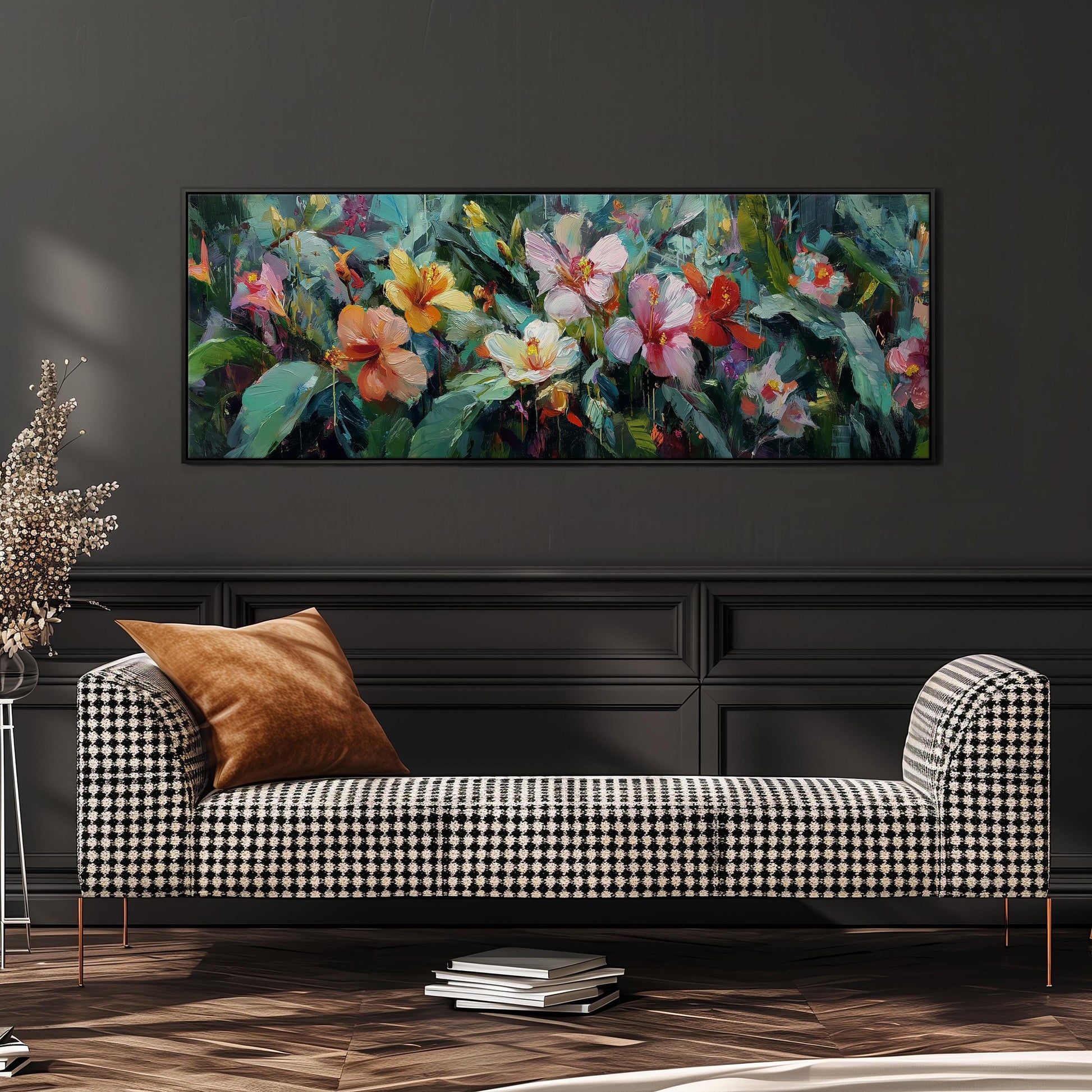 a large, colorful painting of flowers hanging on a wall above a black and white checkered sofa in a living room setting.