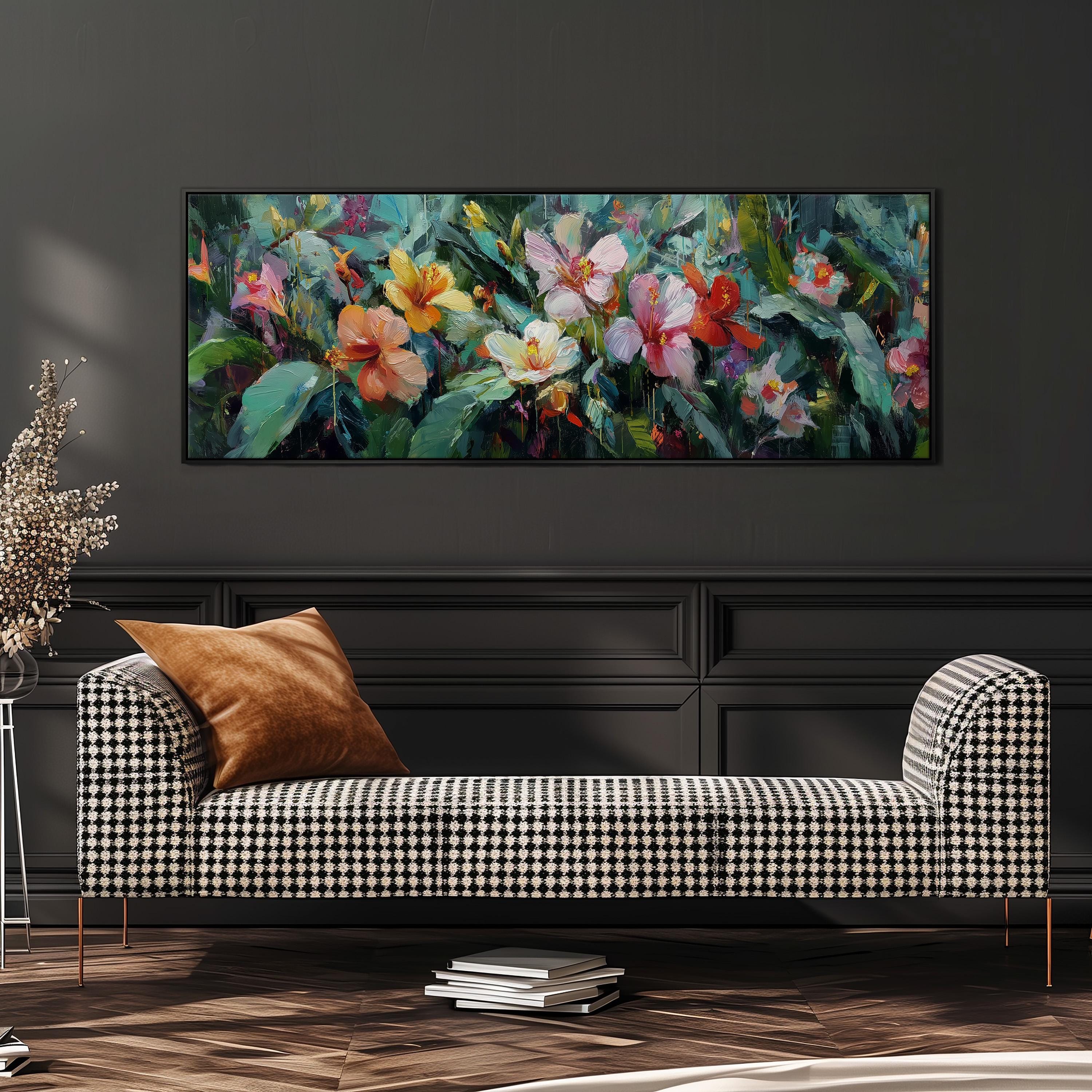 a large, colorful painting of flowers hanging on a wall above a black and white checkered sofa in a living room setting.