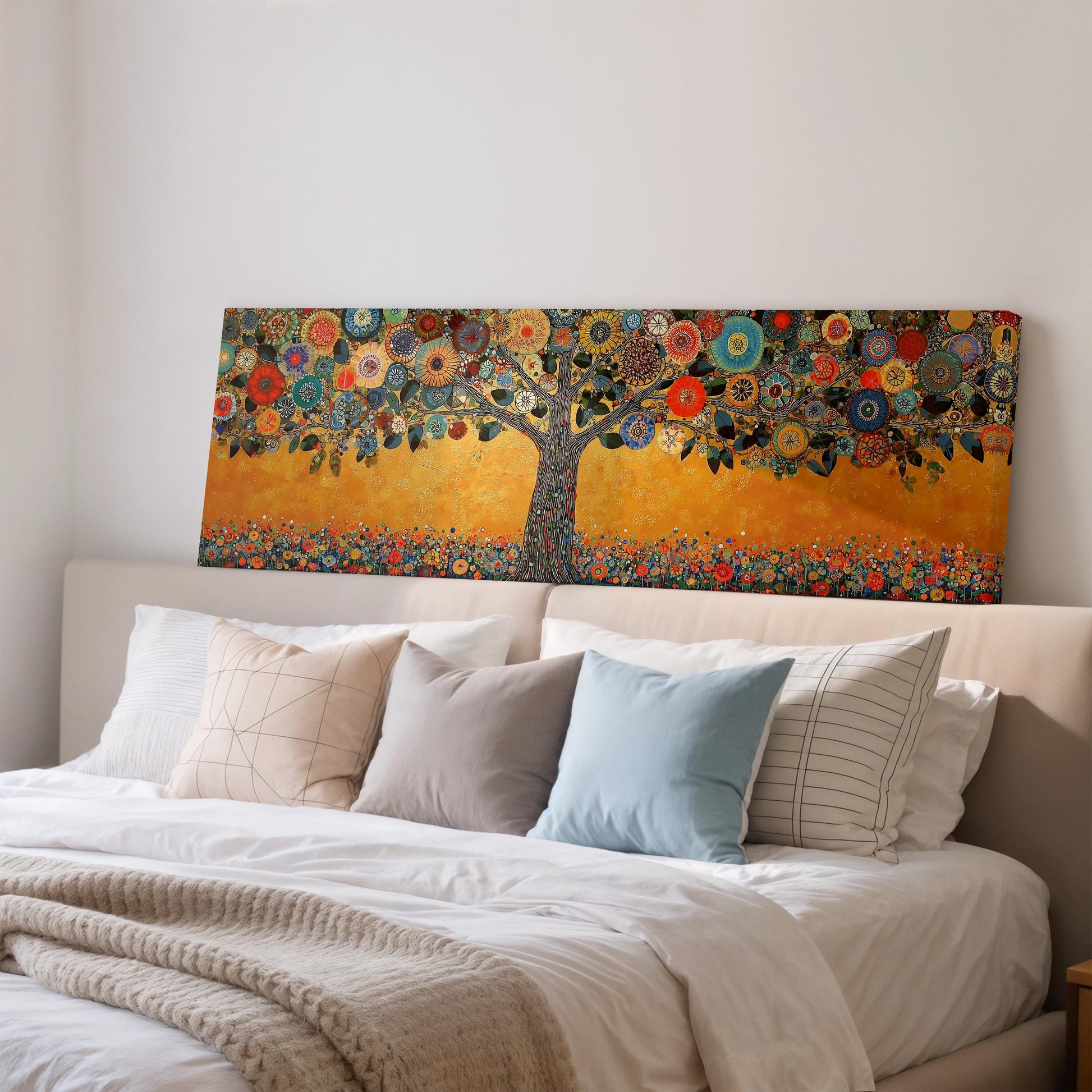 a large, colorful painting of a tree with a vibrant, intricate design on the wall above a bed with white pillows and a blanket.