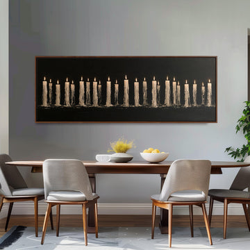 Long row of flickering candles long horizontal canvas print above a sofa in a living room