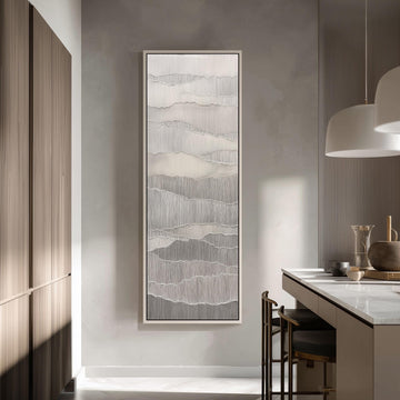 a modern kitchen with a large abstract painting hanging on the wall above a counter. The kitchen has a minimalist design with a white countertop and wooden cabinets.