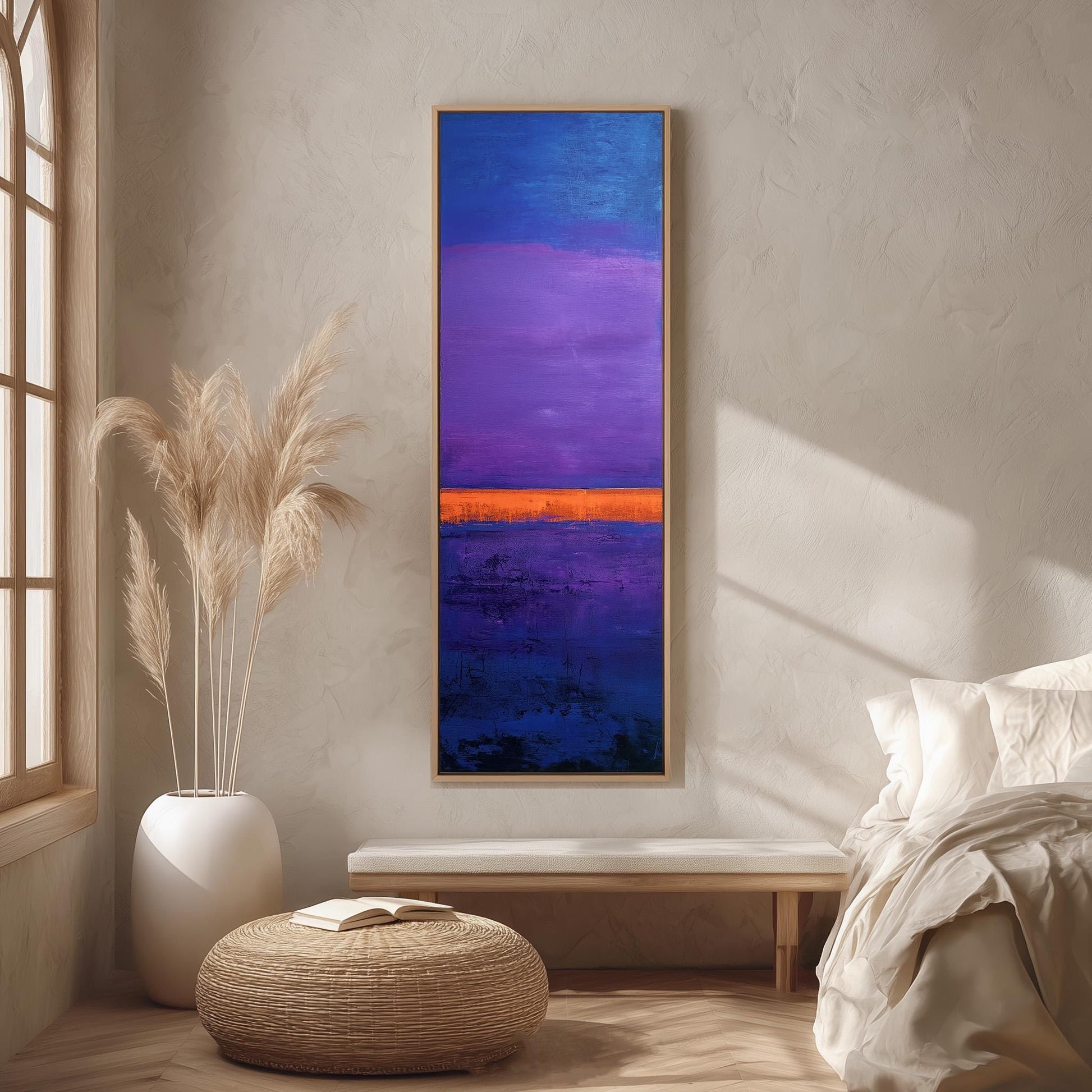 a modern bedroom with a large abstract painting hanging on the wall, a white bed with a white pillow, a white ottoman, and a tall potted plant.