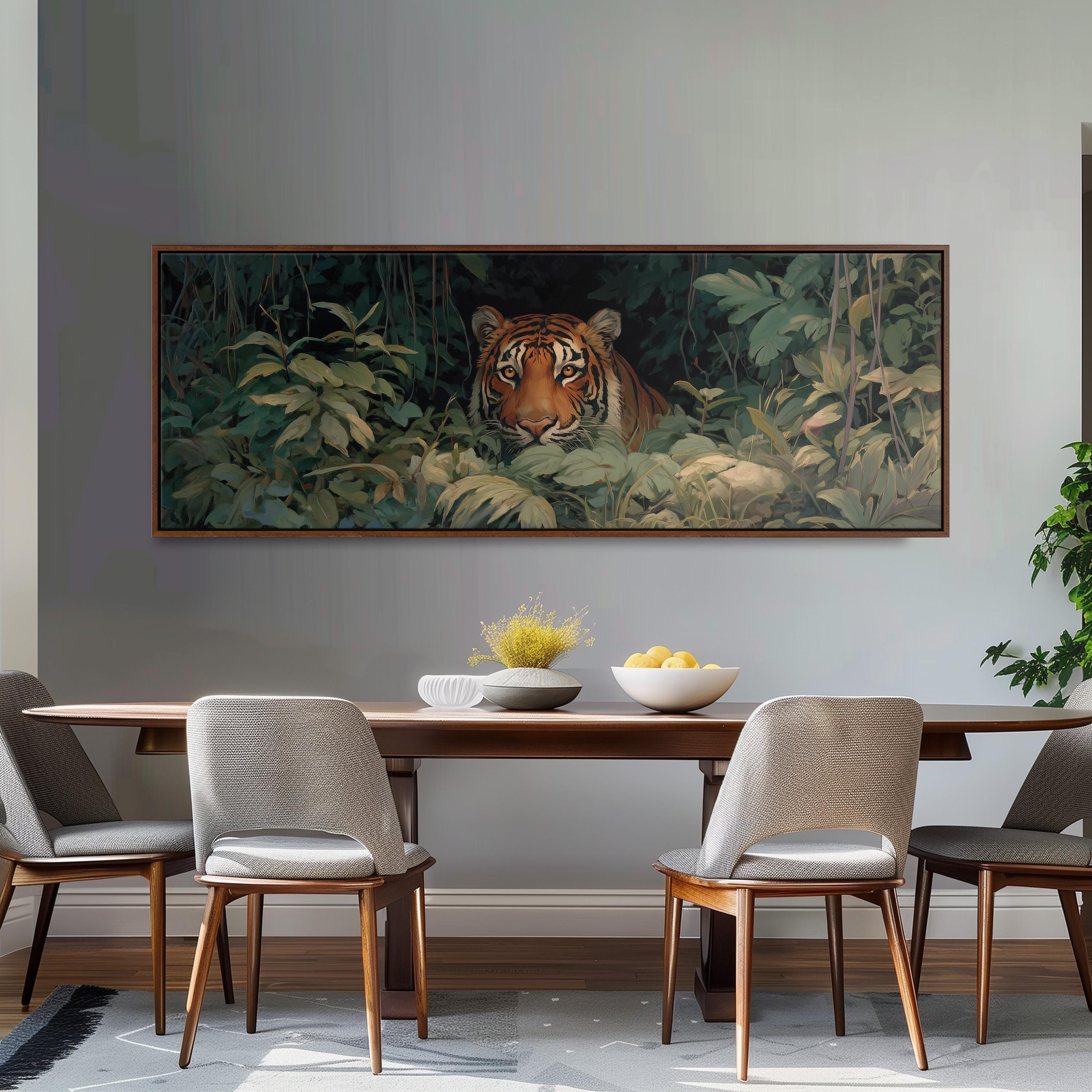 a dining room with a large painting of a tiger on the wall above a wooden table with four chairs. The painting is surrounded by lush greenery, creating a serene and natural atmosphere.