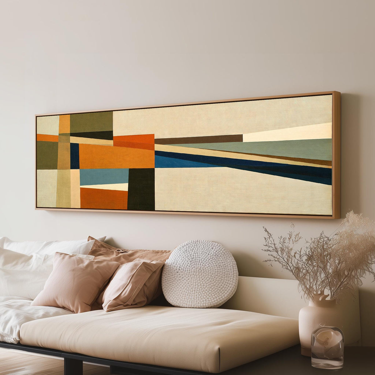 Olive and rust geometric blocks long horizontal canvas print above a sofa in a living room