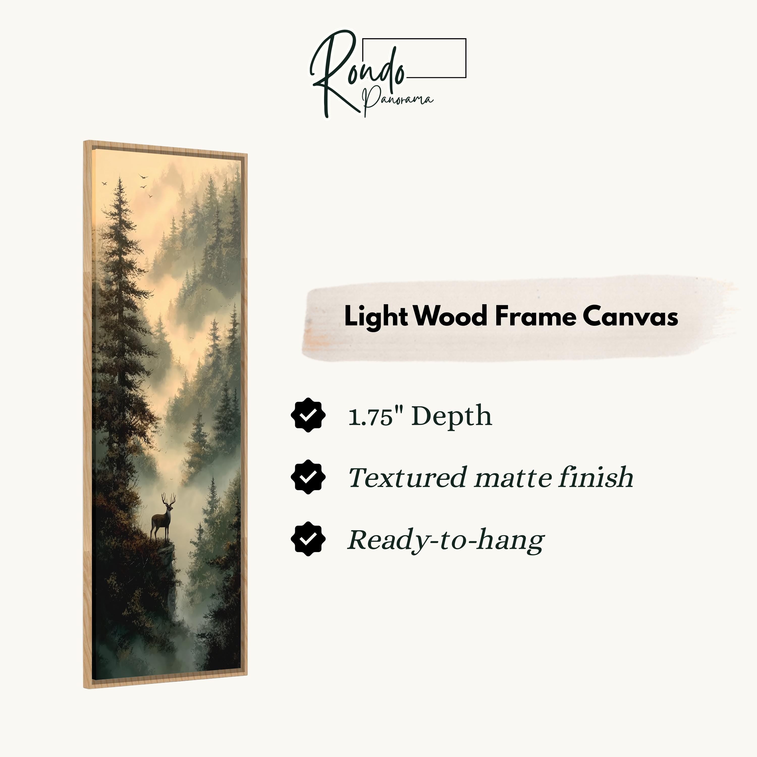 The image is a light wood frame canvas depicting a forest scene with a deer standing on a cliff.