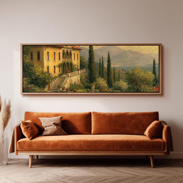 Tuscan villa among cypress hills long horizontal canvas print above a sofa in a living room