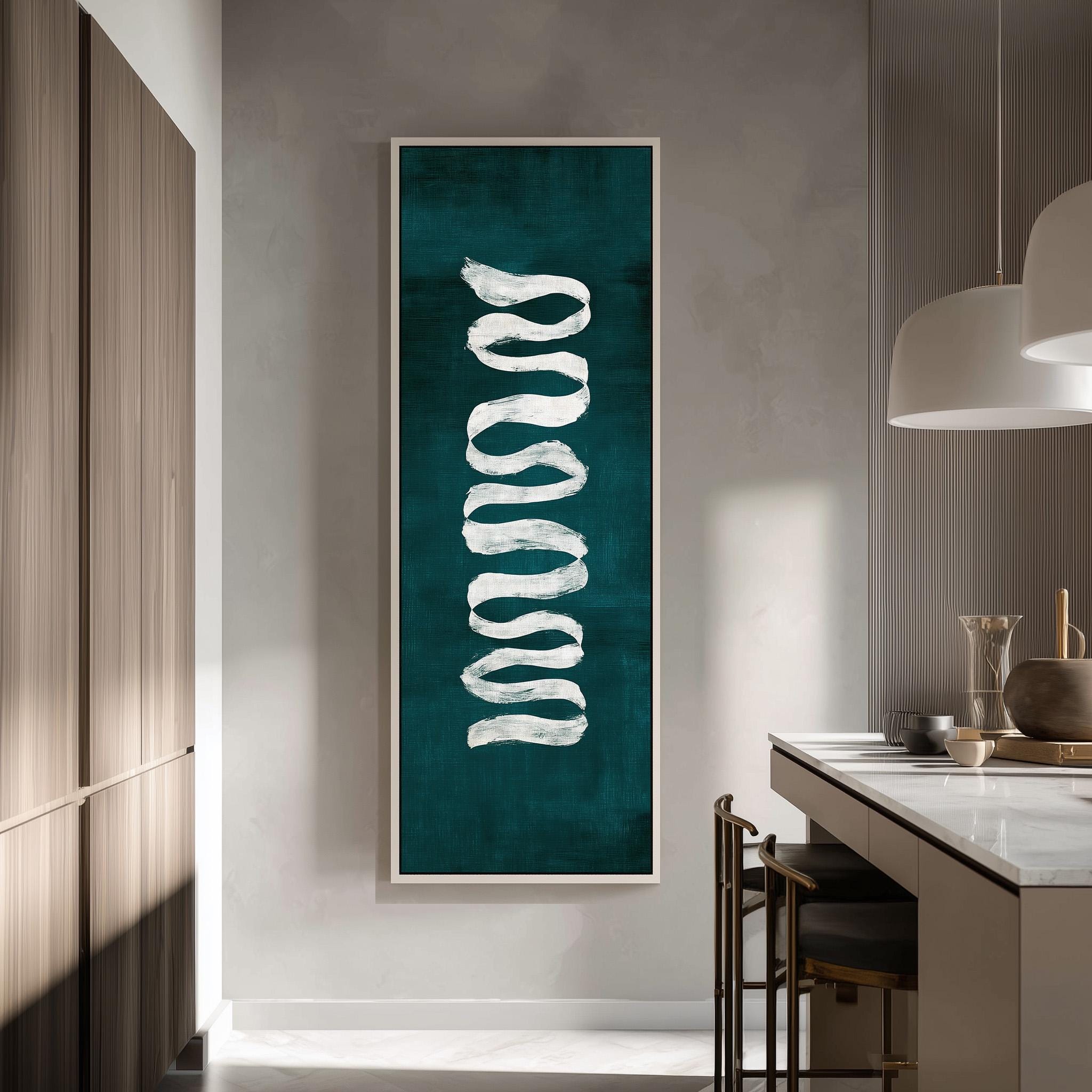 a modern kitchen with a large abstract painting hanging on the wall. The painting has a teal background with white lines, creating a striking visual contrast. The kitchen is well-equipped with a countertop, cabinets, and a dining table with chairs.