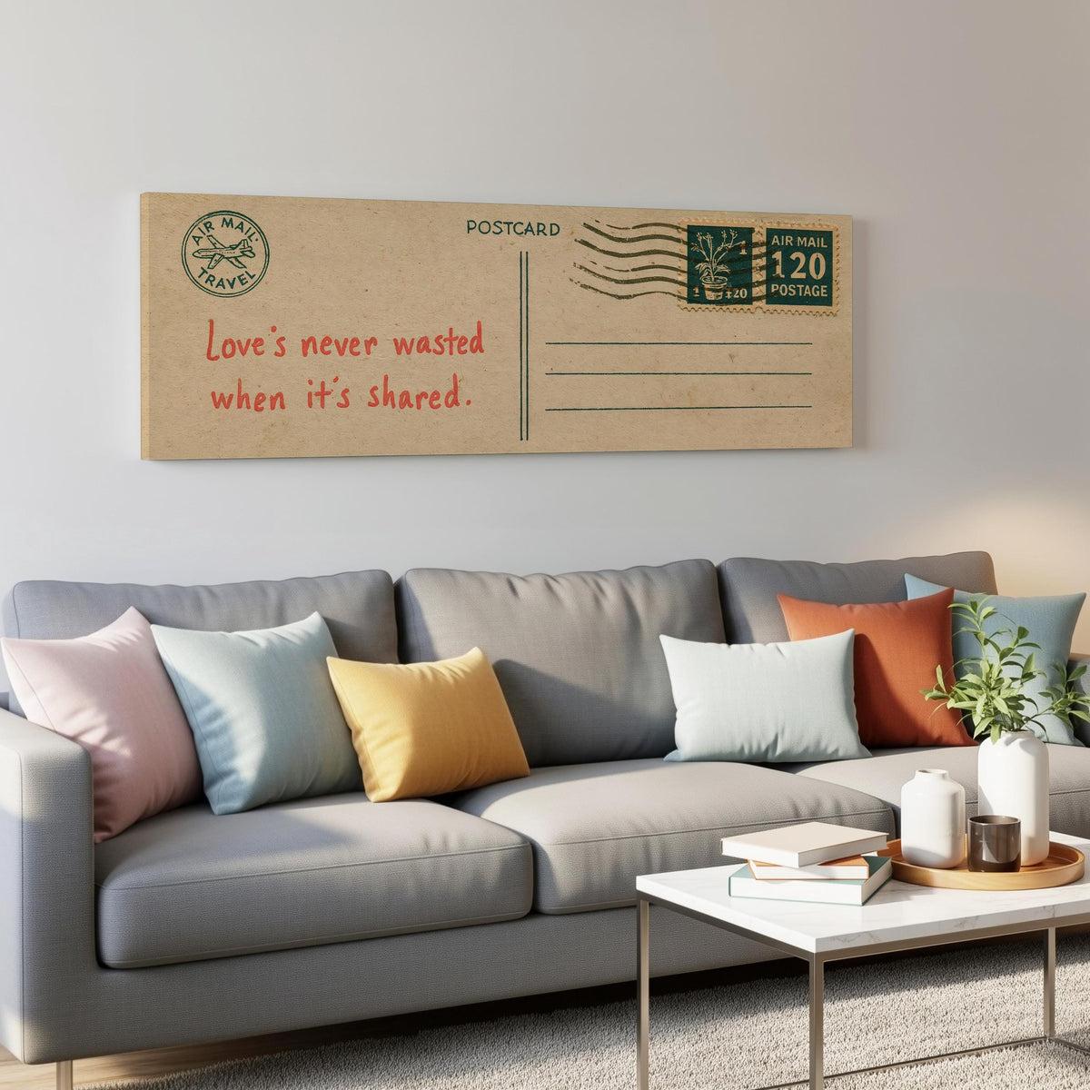 Vintage postcard with a love quote panoramic canvas print above a grey sofa in a living room