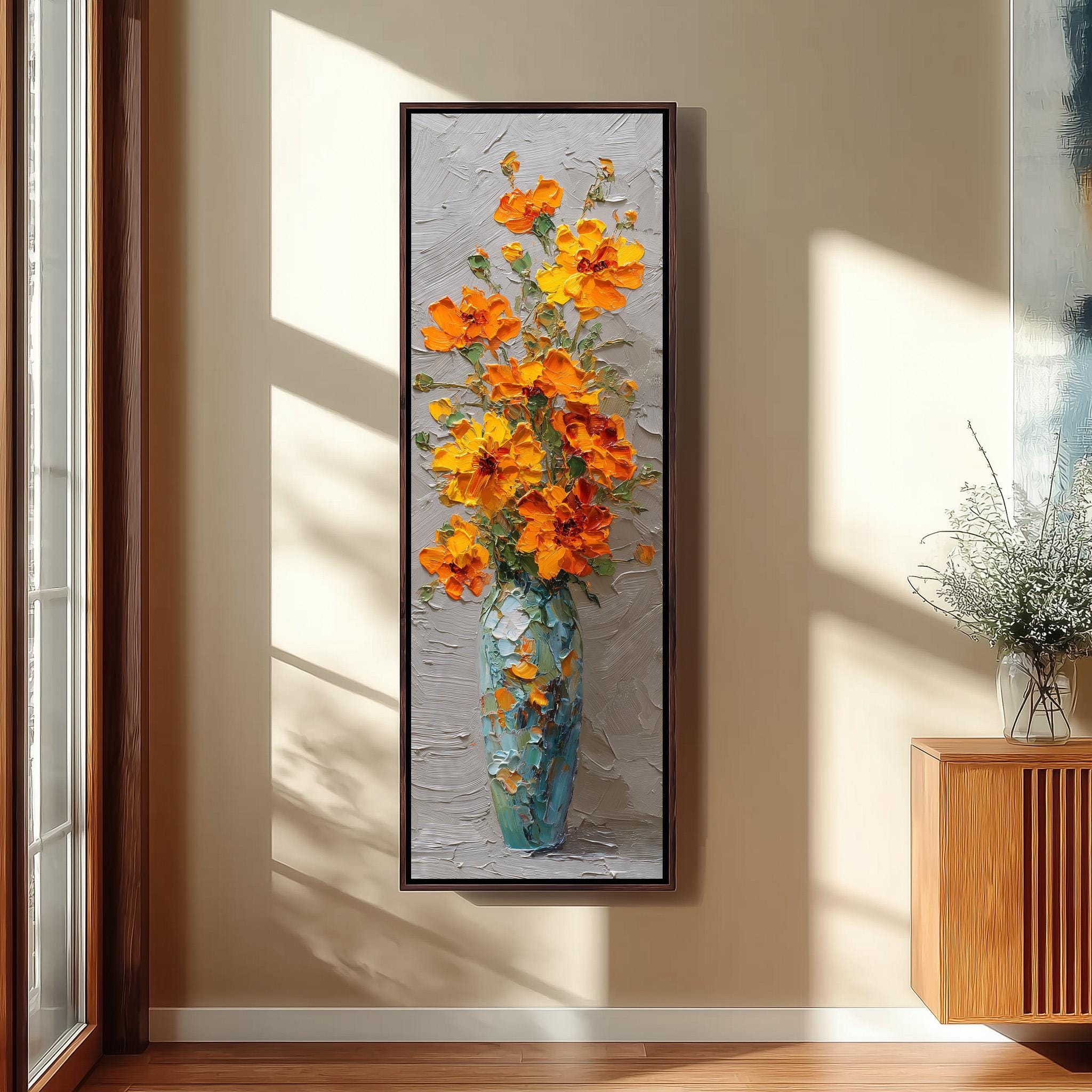 a large painting of a vase filled with orange flowers hanging on a wall.