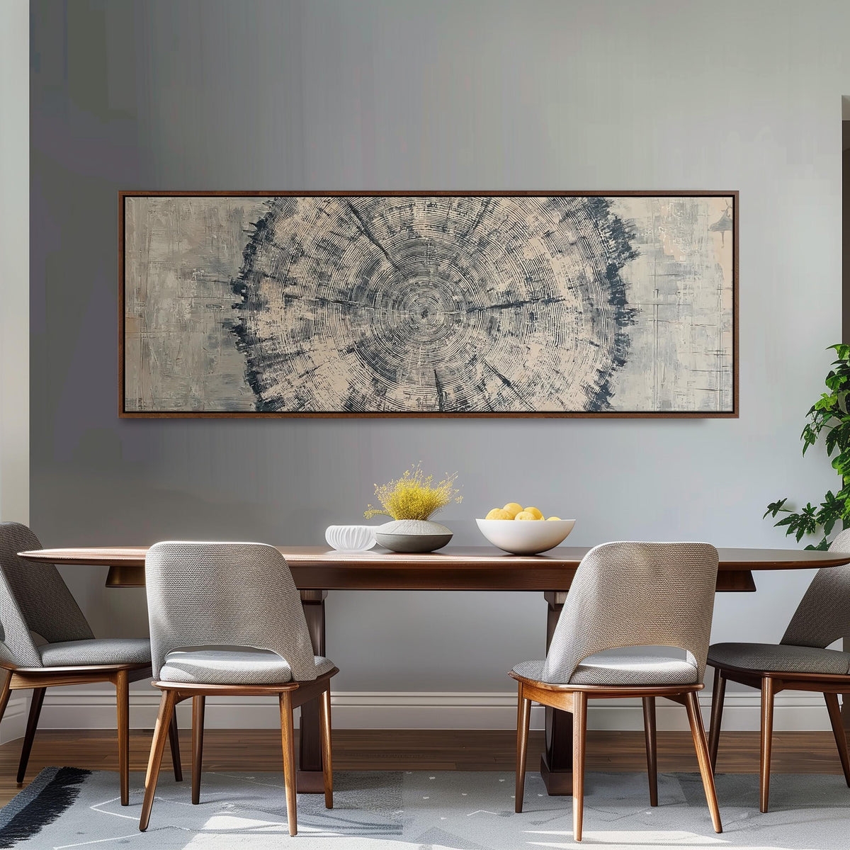 Navy ink tree ring long horizontal canvas print above a dining table