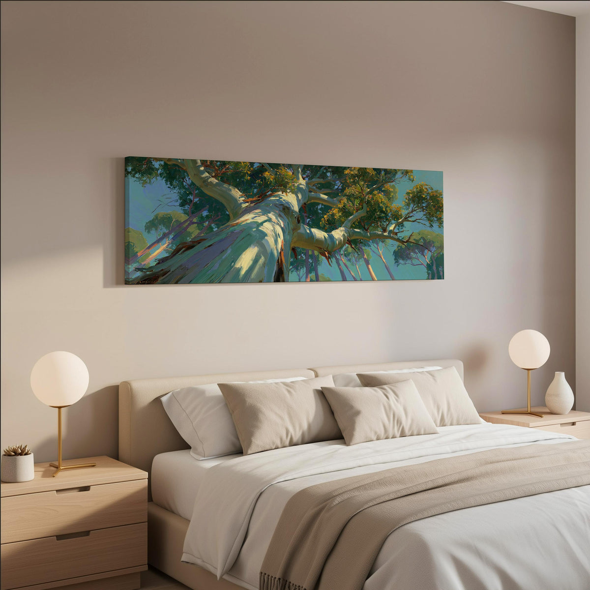 Eucalyptus canopy against a blue sky wide panoramic canvas print above a bed in a neutral bedroom