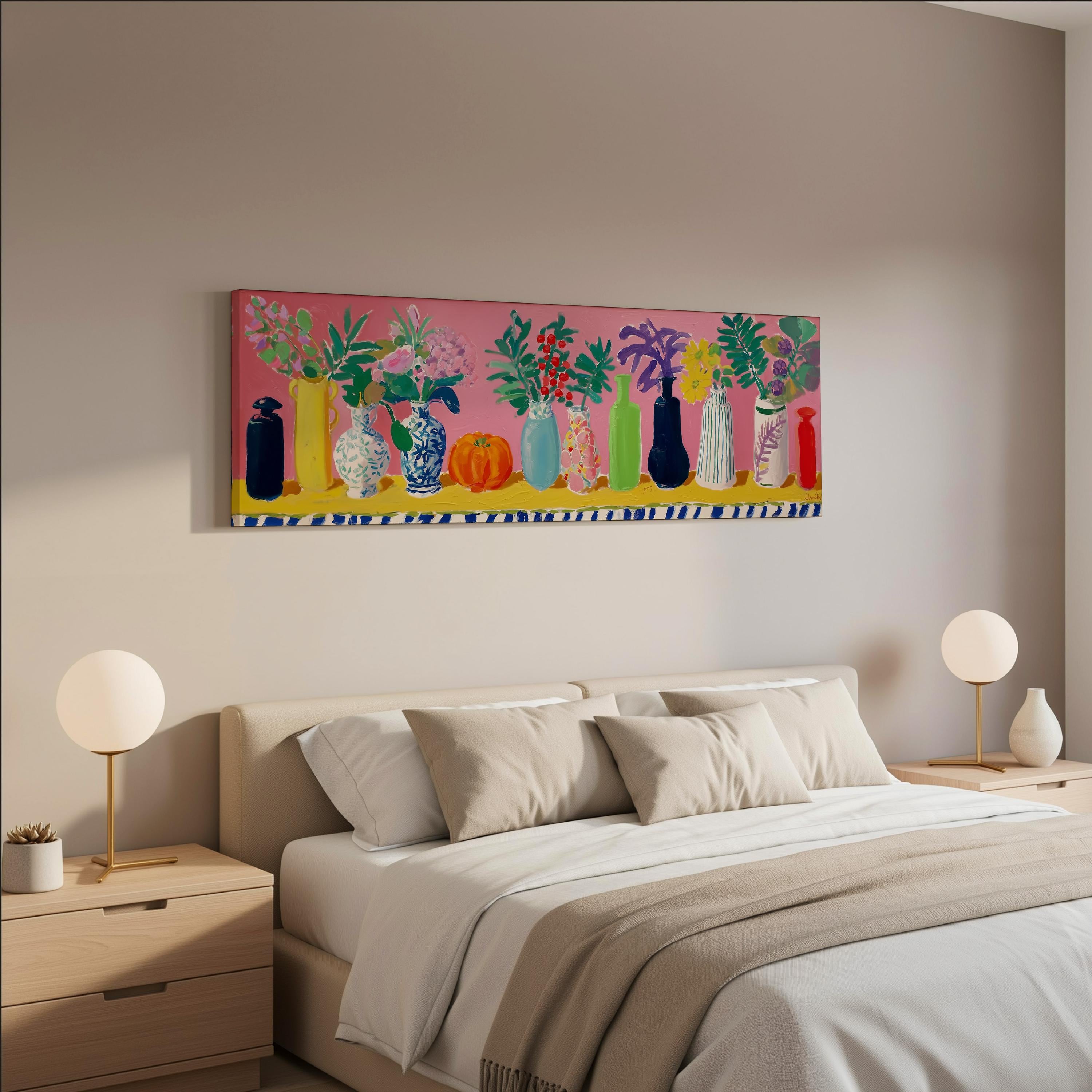 a bedroom with a large bed, two nightstands with lamps, and a colorful painting of vases on the wall above the bed.