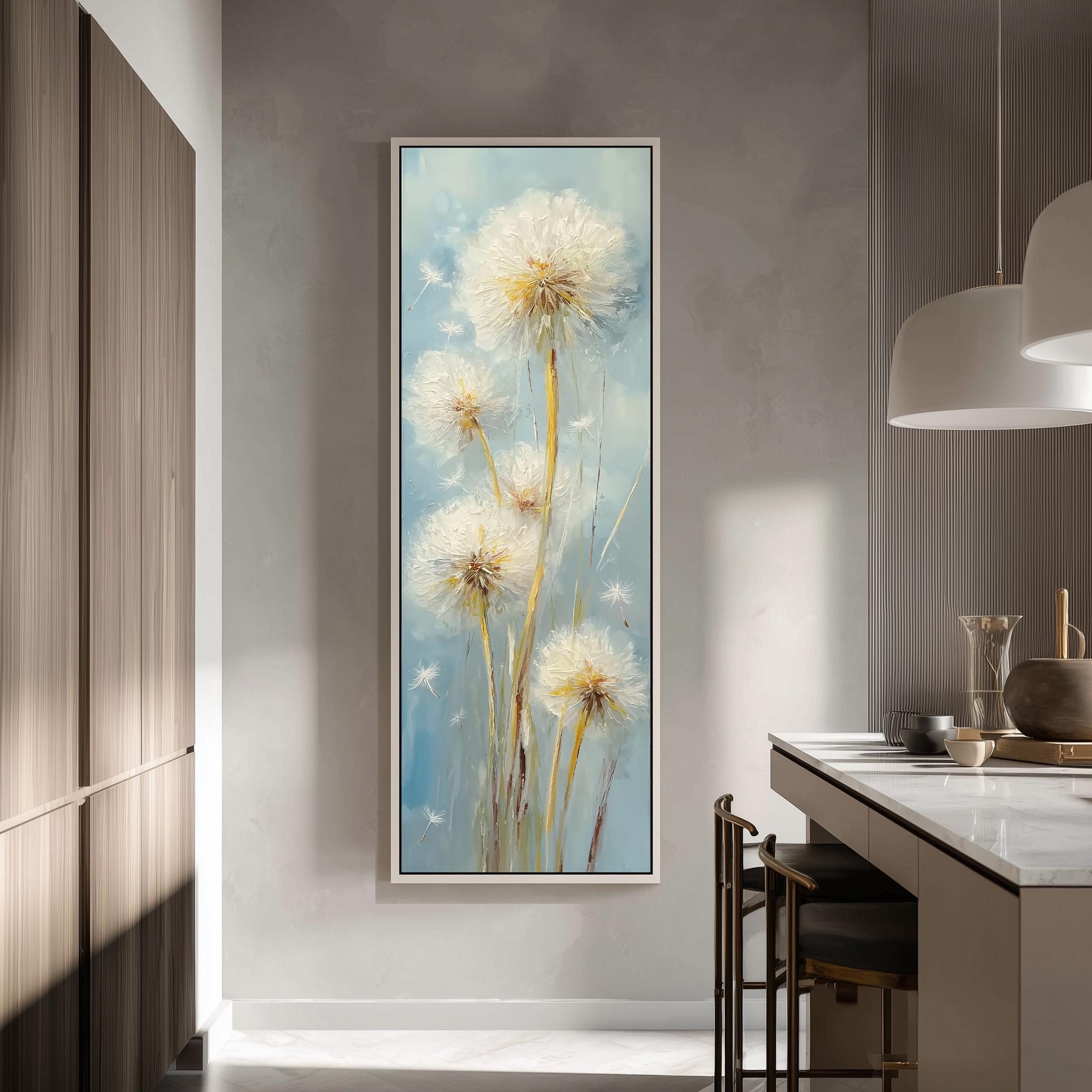 a large painting of dandelions hanging on a wall in a modern kitchen.
