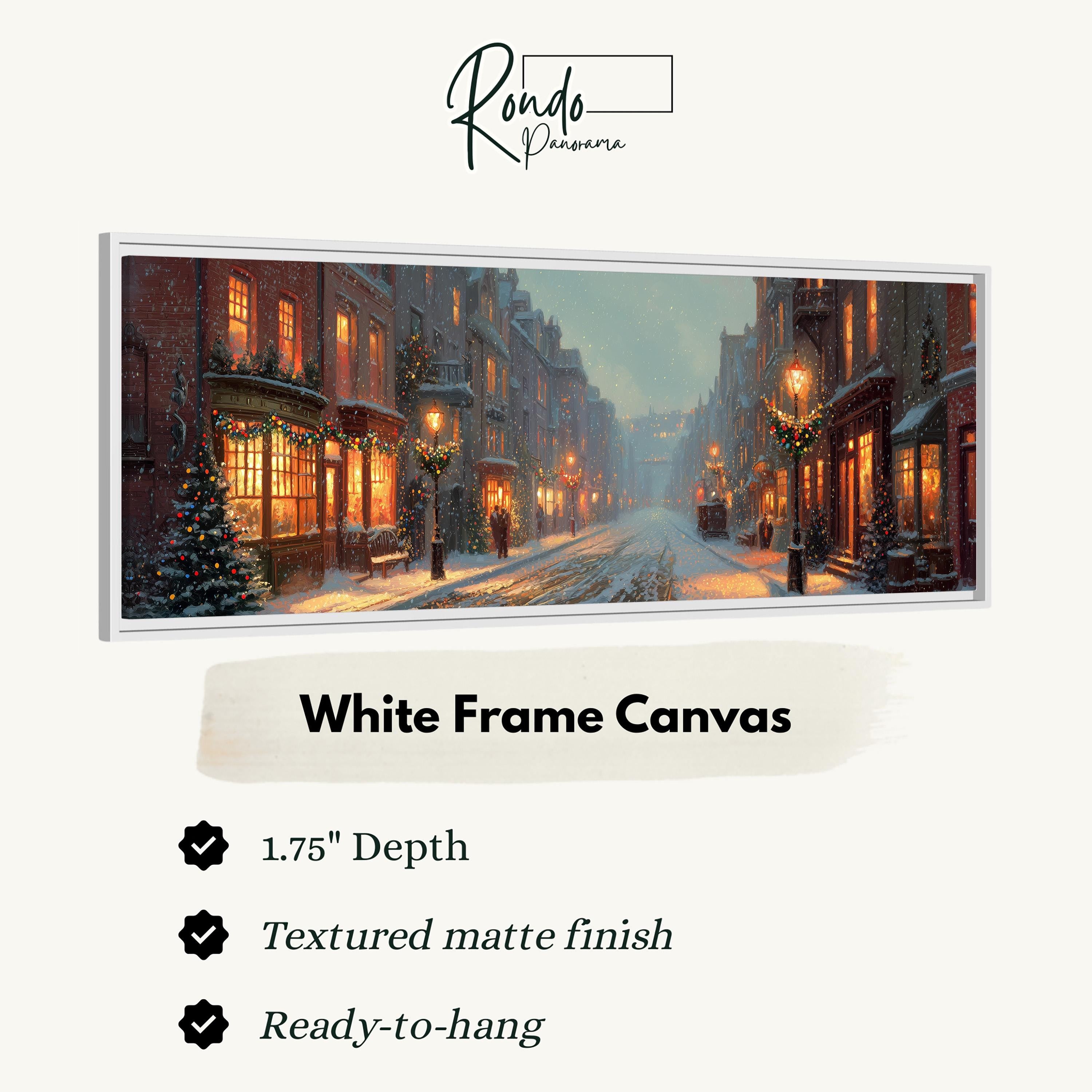 A white frame canvas depicting a snowy city street at night with illuminated buildings and Christmas trees.