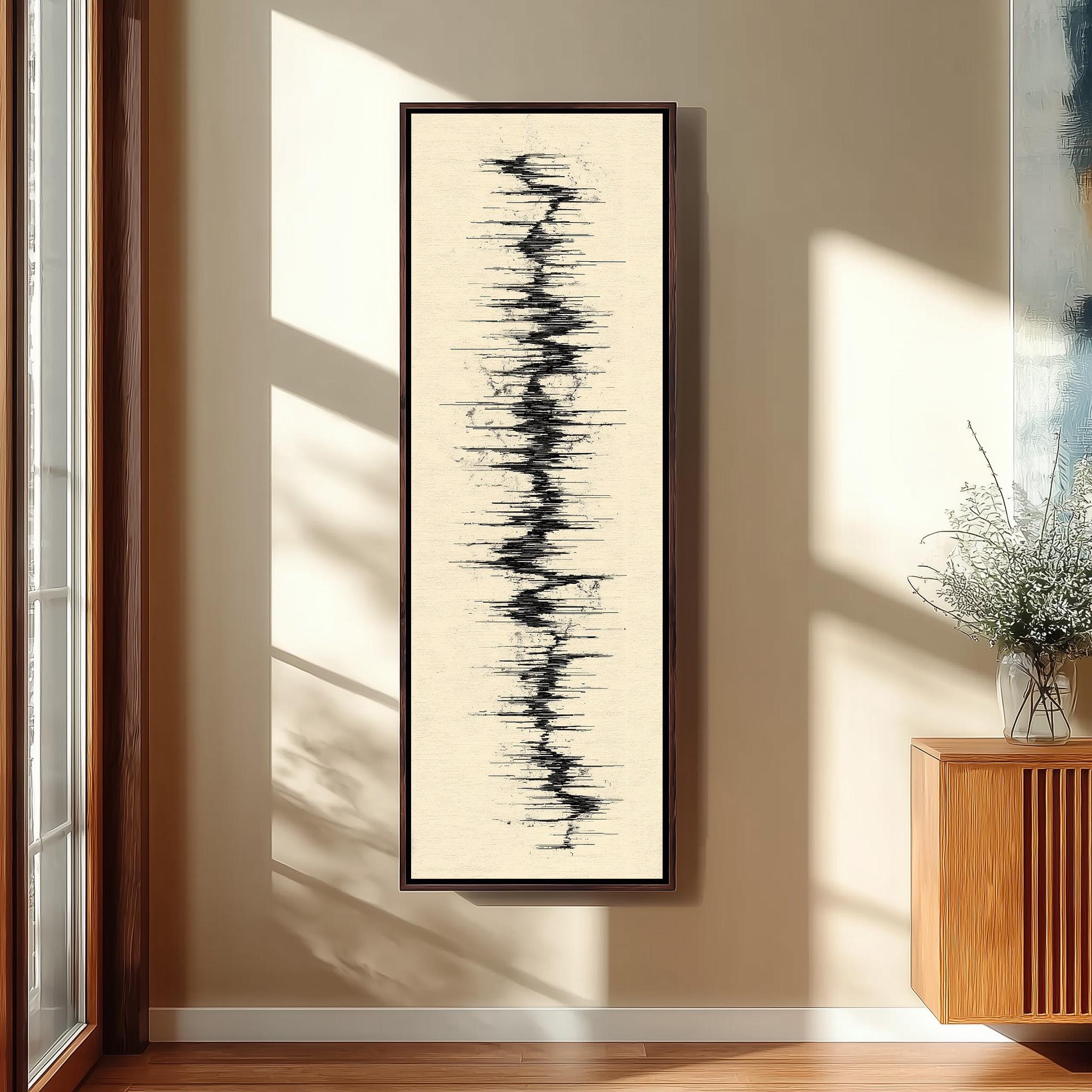 a large abstract painting hanging on a wall in a room with wooden furniture.