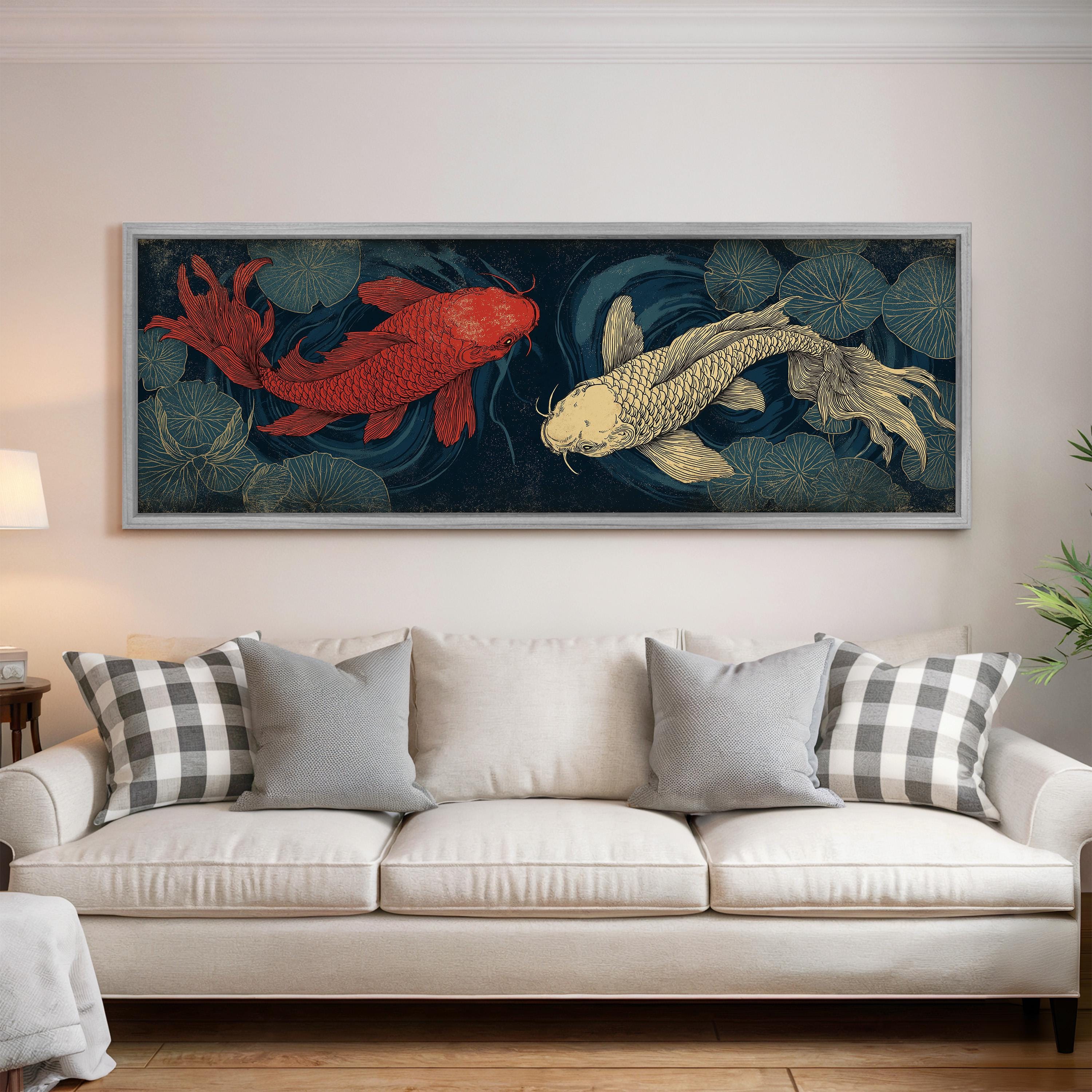 a large framed painting of two koi fish swimming in a pond, with one fish being red and the other being yellow, set against a dark blue background with green water lilies.