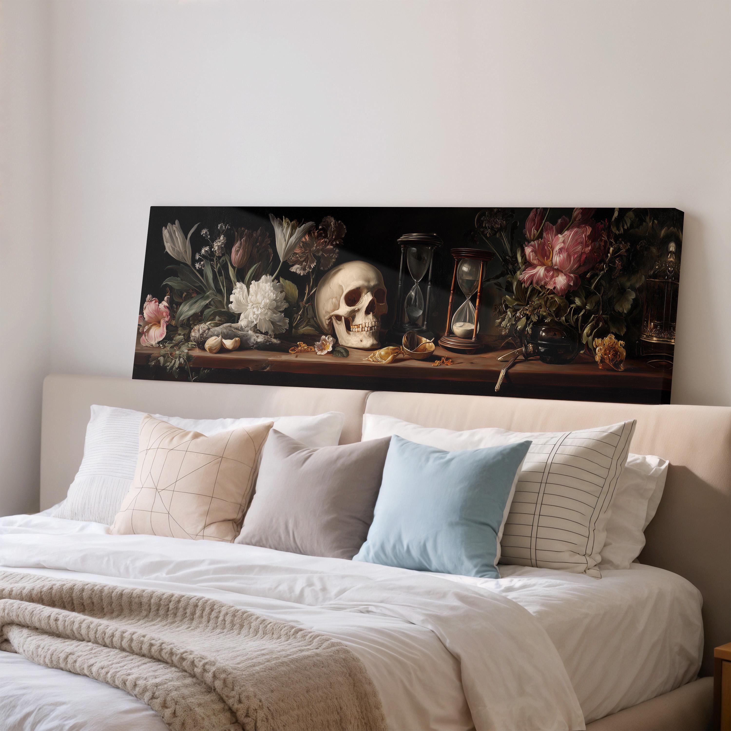 a large painting of a still life arrangement on a wall above a bed with white bedding and pillows.