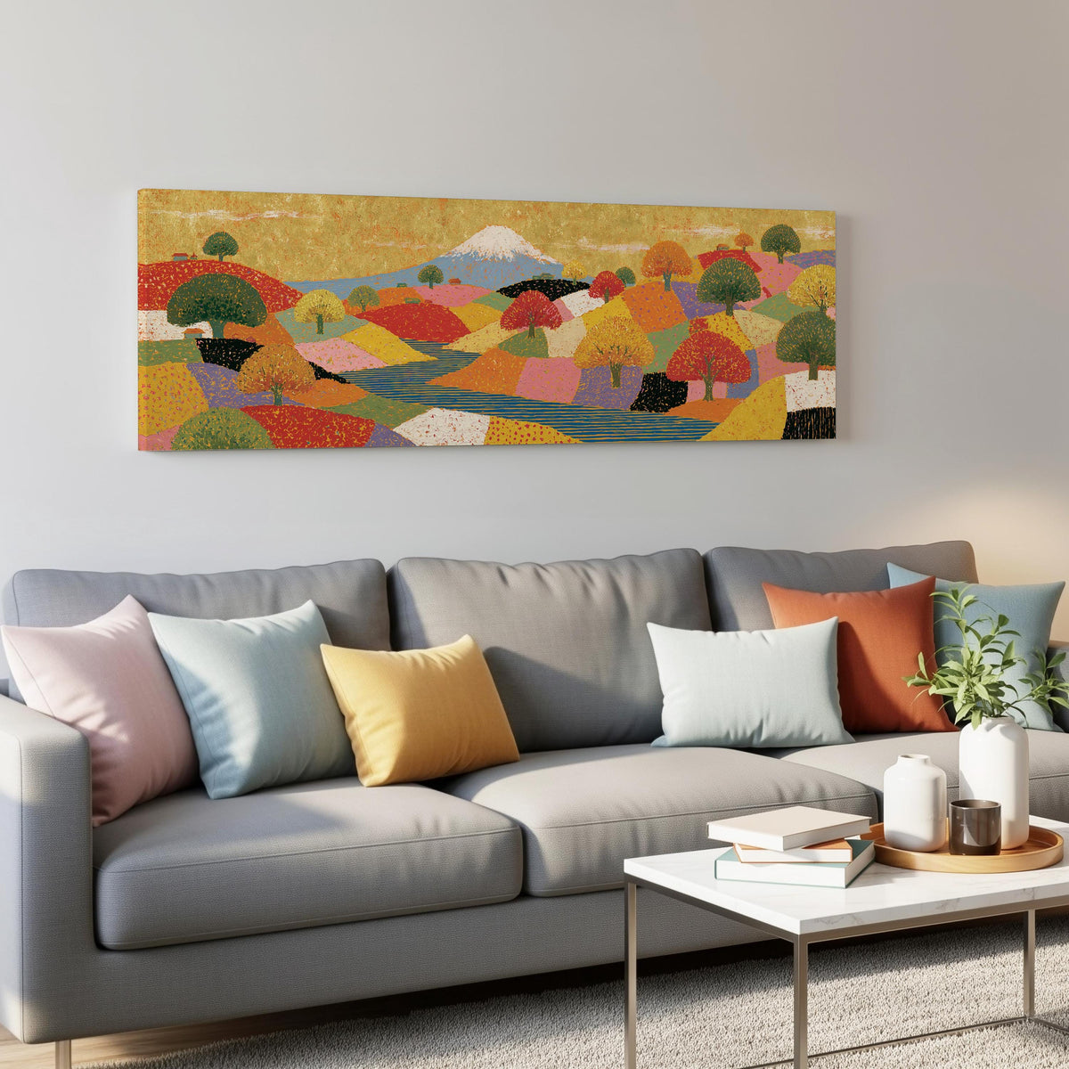 Mount Fuji over golden patchwork hills panoramic canvas print above a grey sofa in a living room