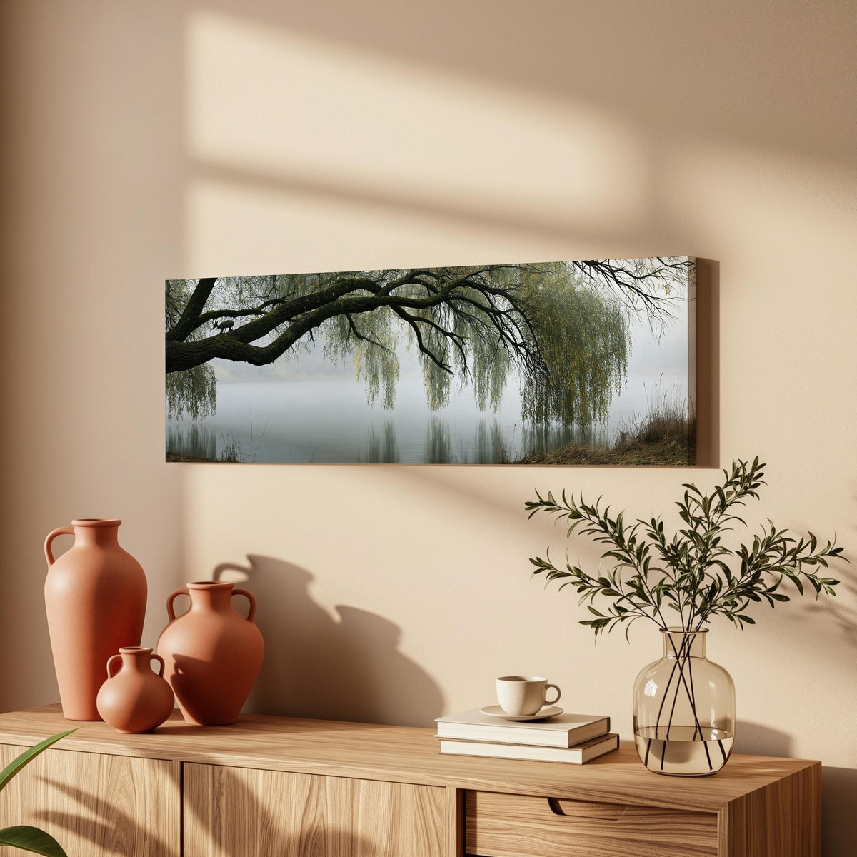 Weeping willow over a misty lake long horizontal canvas print above a wooden sideboard