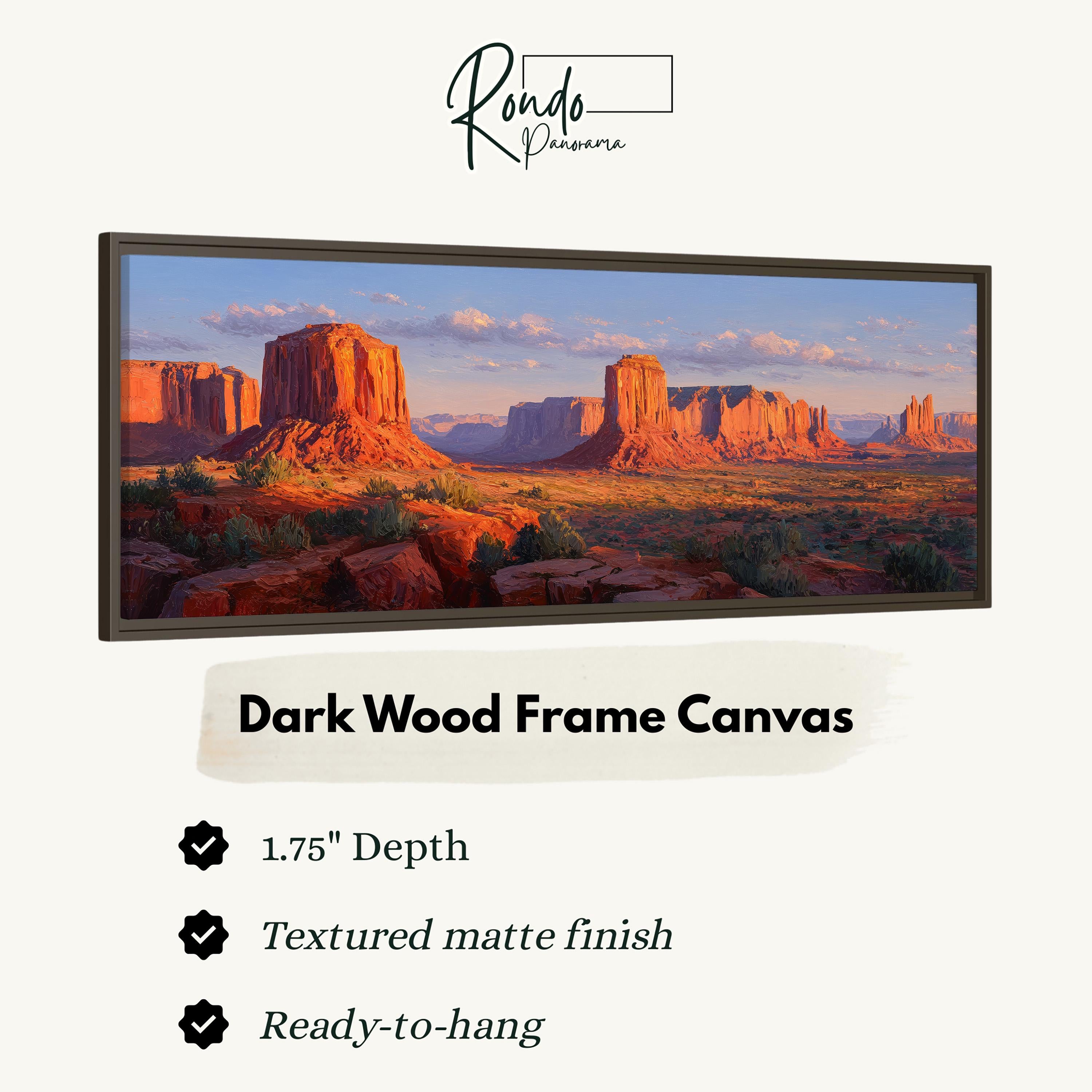The image is a framed canvas depicting a desert landscape with mountains in the background.