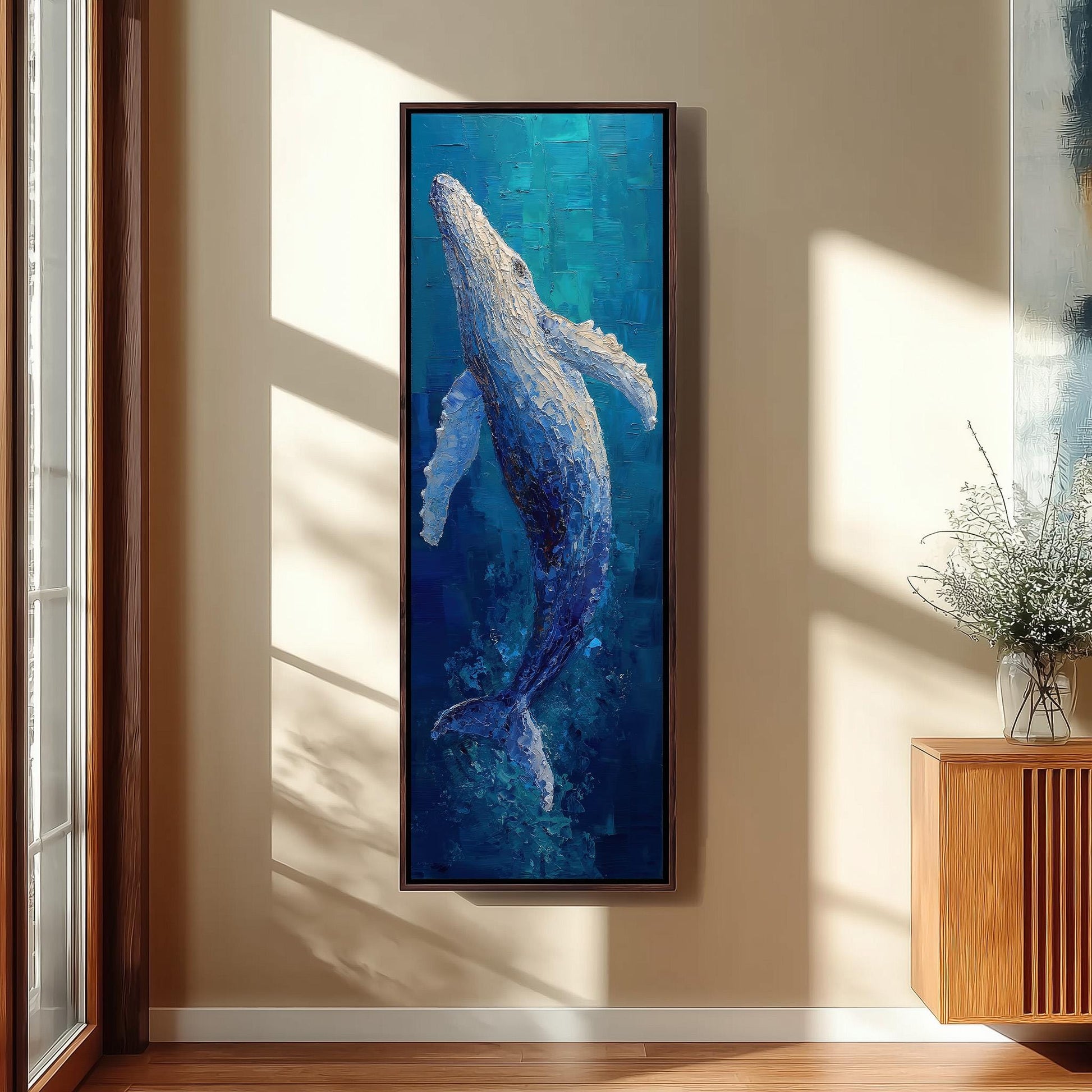 a large painting of a whale hanging on a wall in a room with a wooden floor.