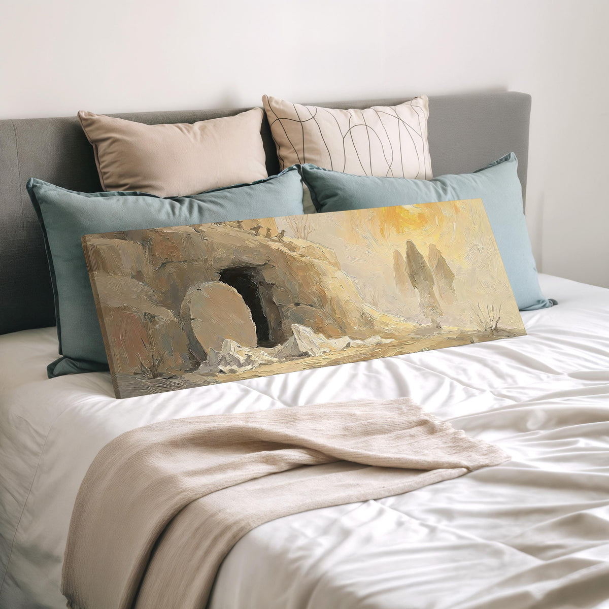 The empty tomb at sunrise wide panoramic canvas print laid on a bed to show its size