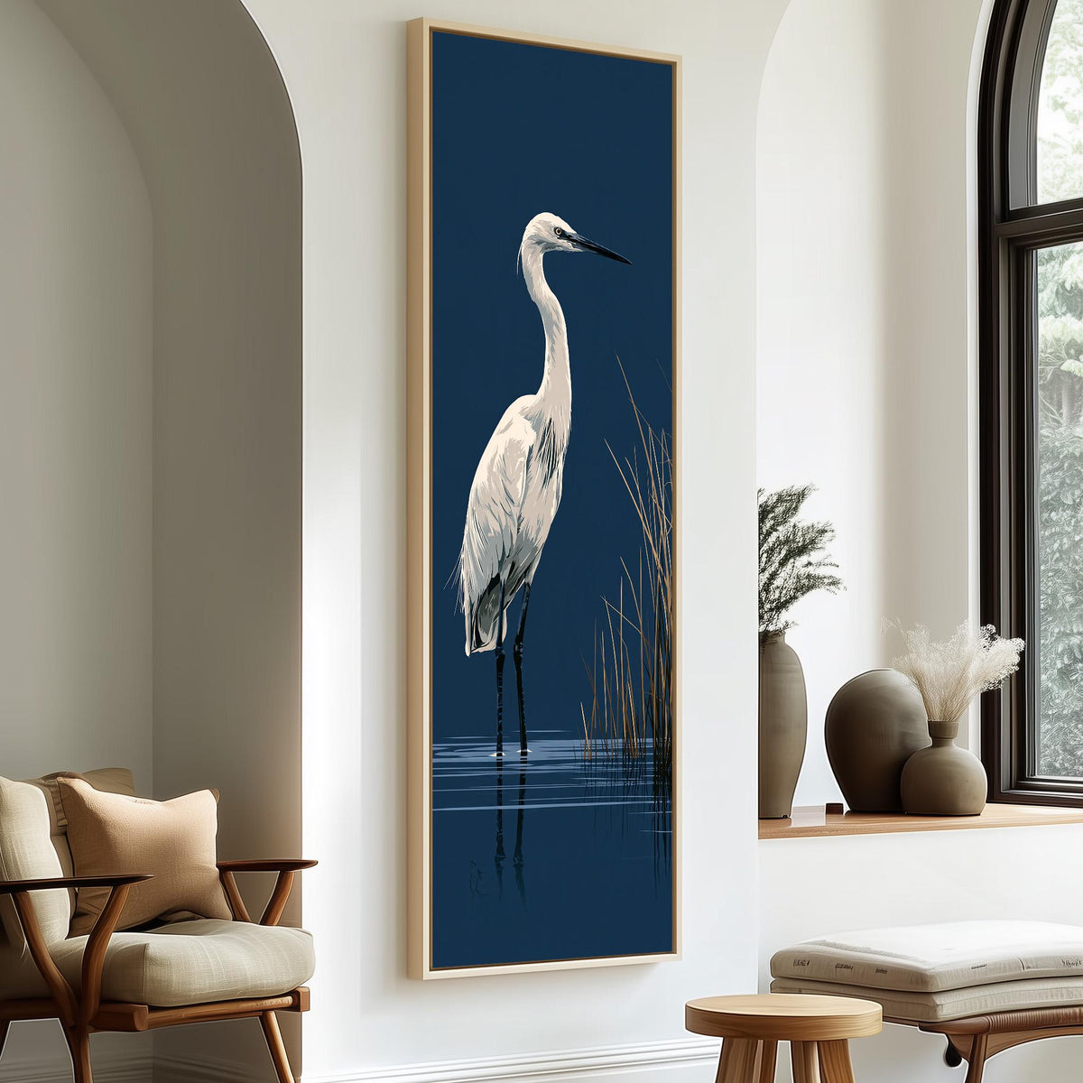 White egret wading on navy tall skinny canvas print in a sunlit living space