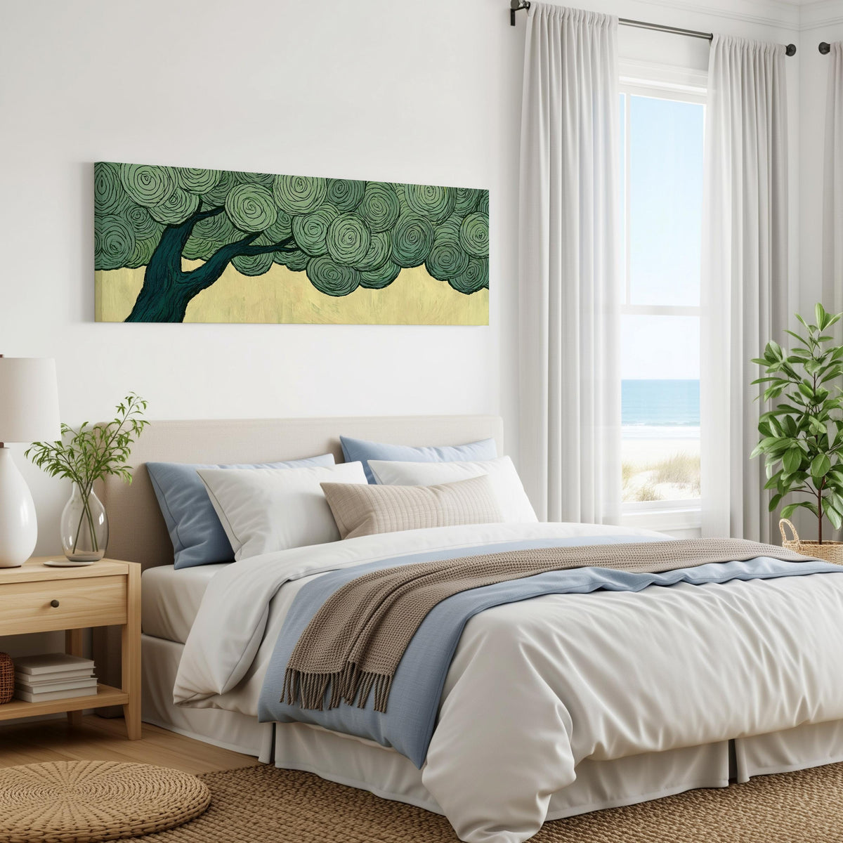 Tree with a swirling green canopy panoramic canvas print above a bed in a coastal bedroom
