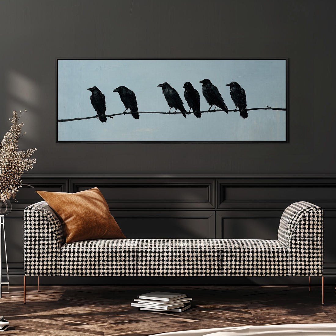 Ravens spaced along a wire long horizontal canvas print above a sofa in a living room