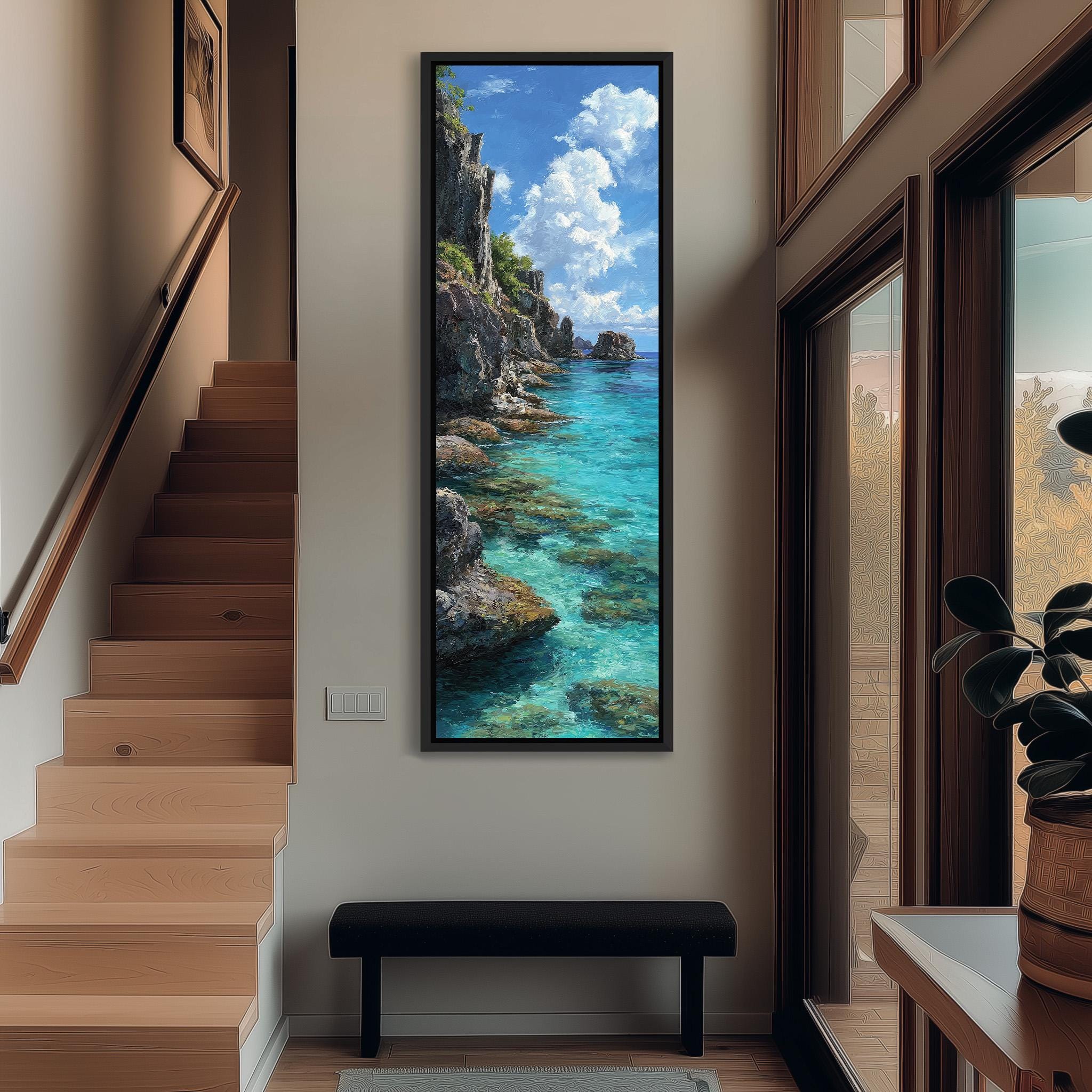 a large, framed painting of a serene coastal landscape hanging on the wall of a room with wooden stairs and a bench.