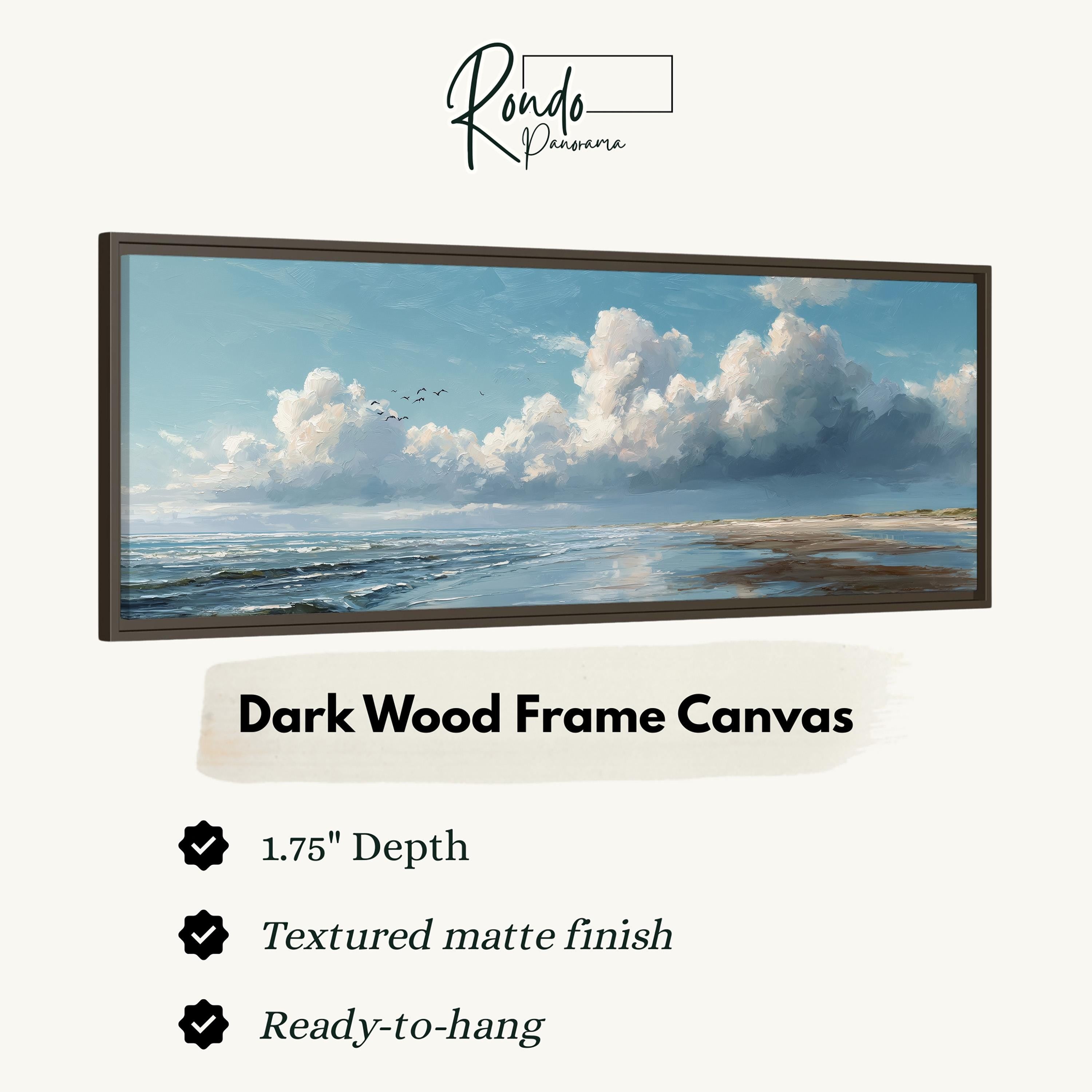 The image is a framed canvas depicting a serene landscape with a cloudy sky and ocean.