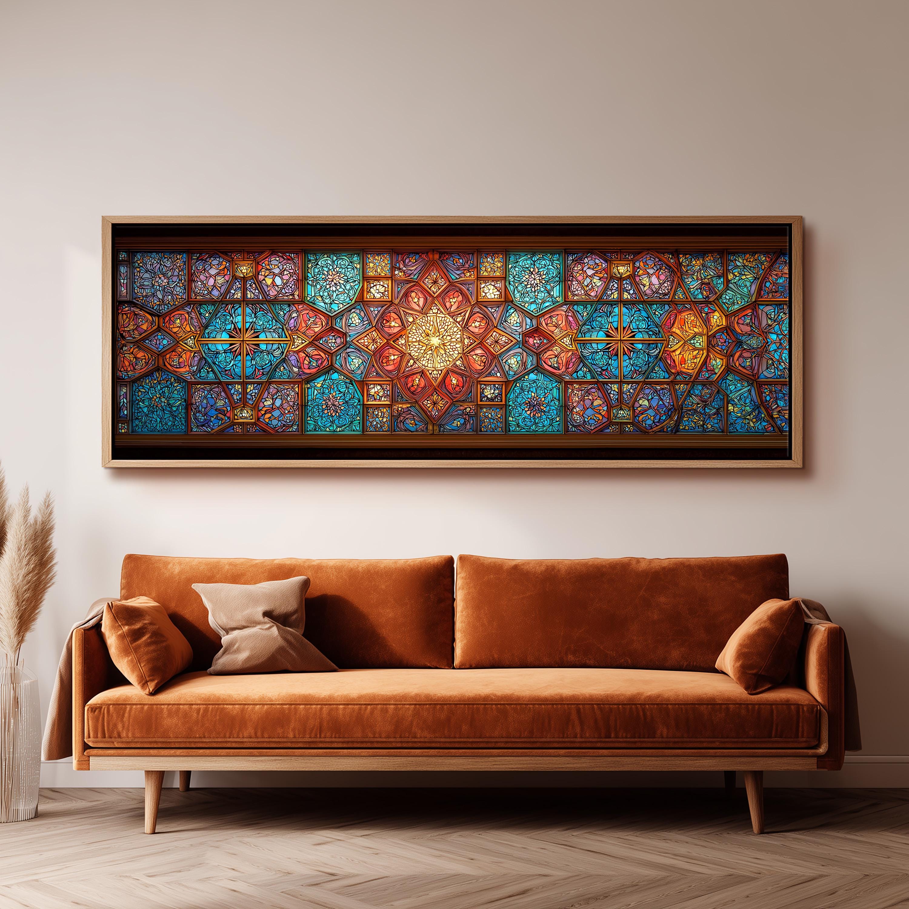 a large, ornate stained glass window with intricate designs and vibrant colors, hanging above a brown sofa in a living room setting.