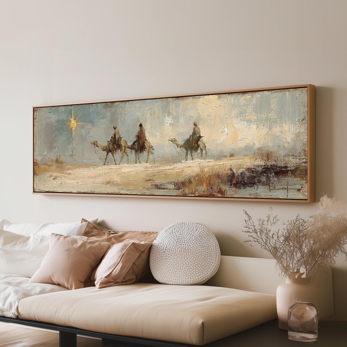 Wise men on camels following the star long horizontal canvas print above a sofa in a living room