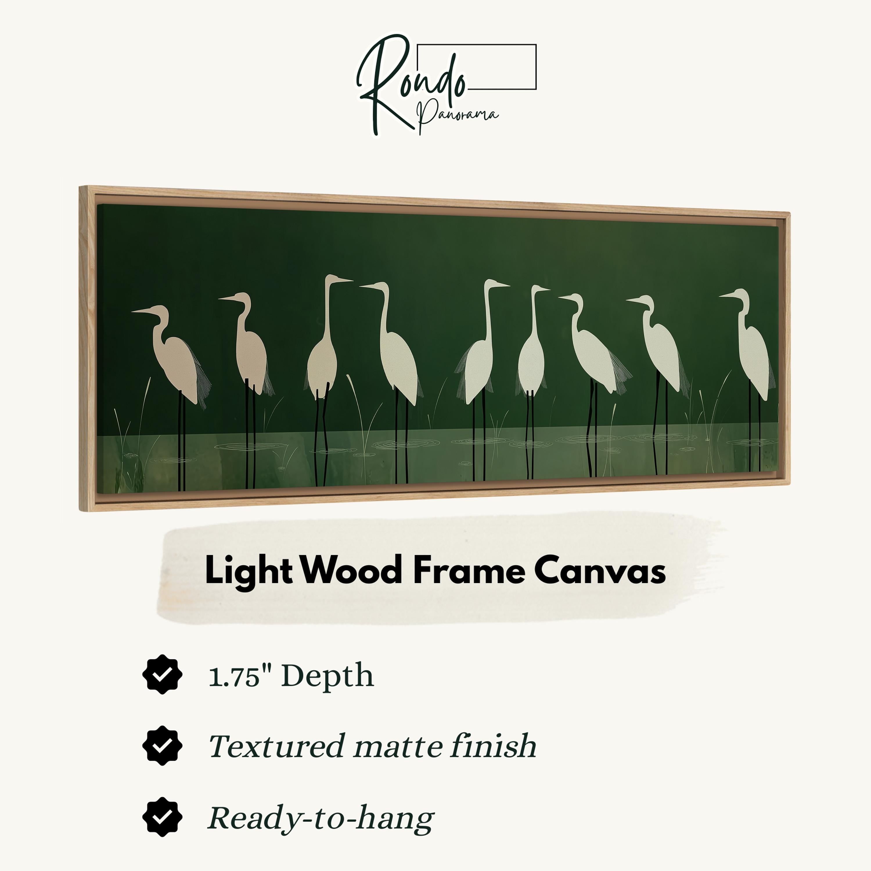 a light wood frame canvas with a green background and a line of white birds standing in the grass.