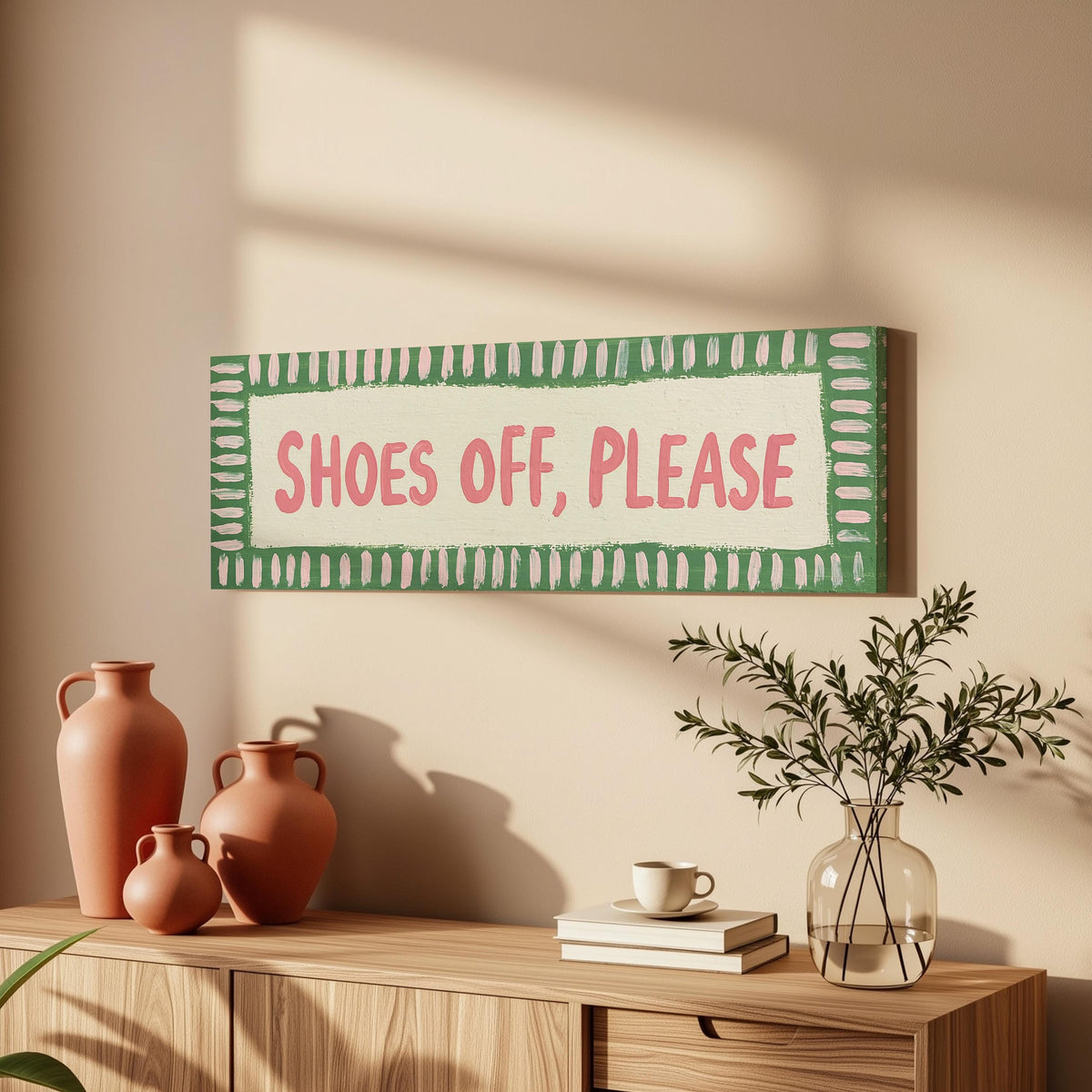 Shoes off, please sign long horizontal canvas print above a sofa in a living room