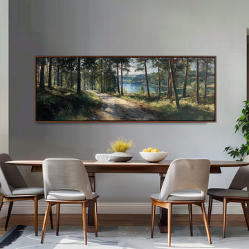 a dining room with a large painting of a forest scene hanging on the wall above a wooden table with four chairs. The table is set with a bowl of fruit and a vase of flowers, creating a cozy and inviting atmosphere.