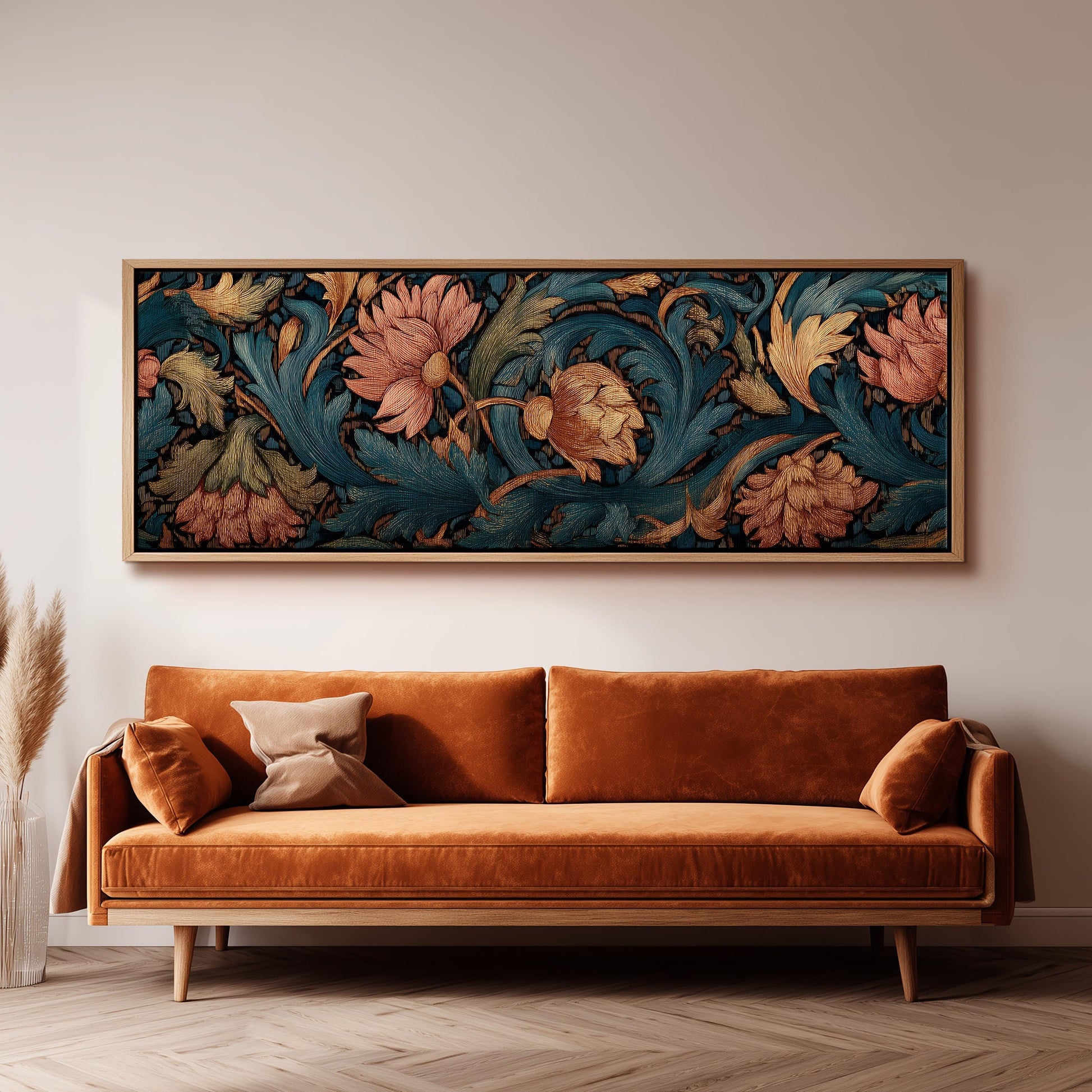 a large, ornate floral painting hanging on a wall above a brown sofa with a wooden frame.