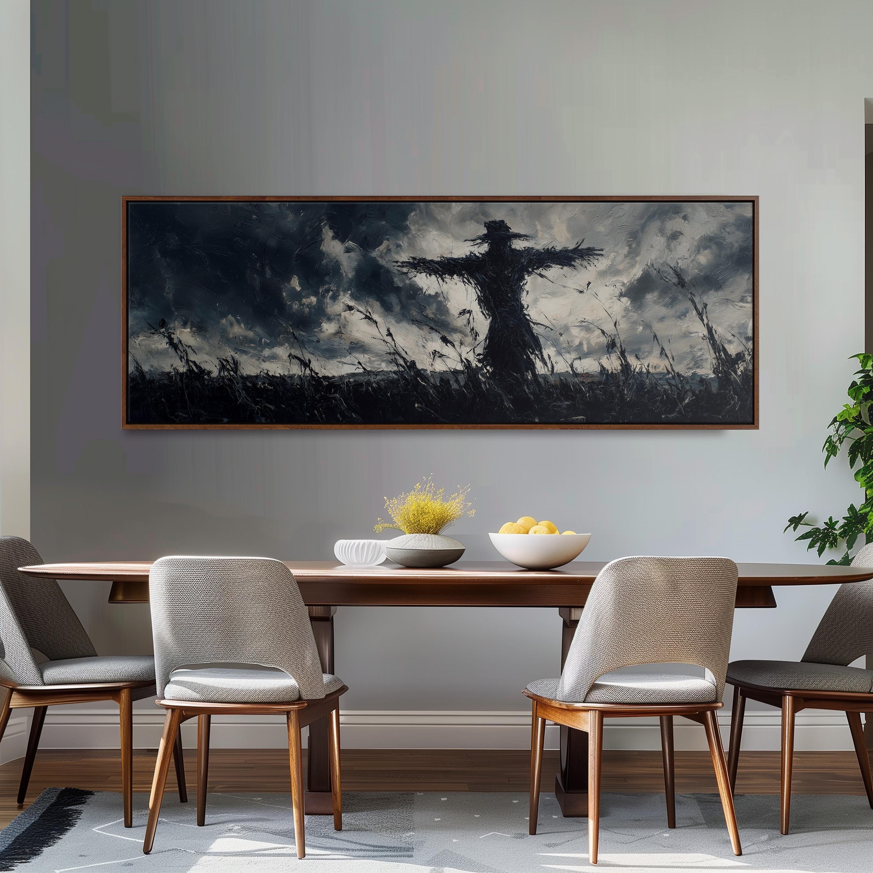a dining room with a large painting of a scarecrow on the wall above a wooden dining table. The table is set with a bowl of fruit and a vase of flowers, creating a cozy and inviting atmosphere.