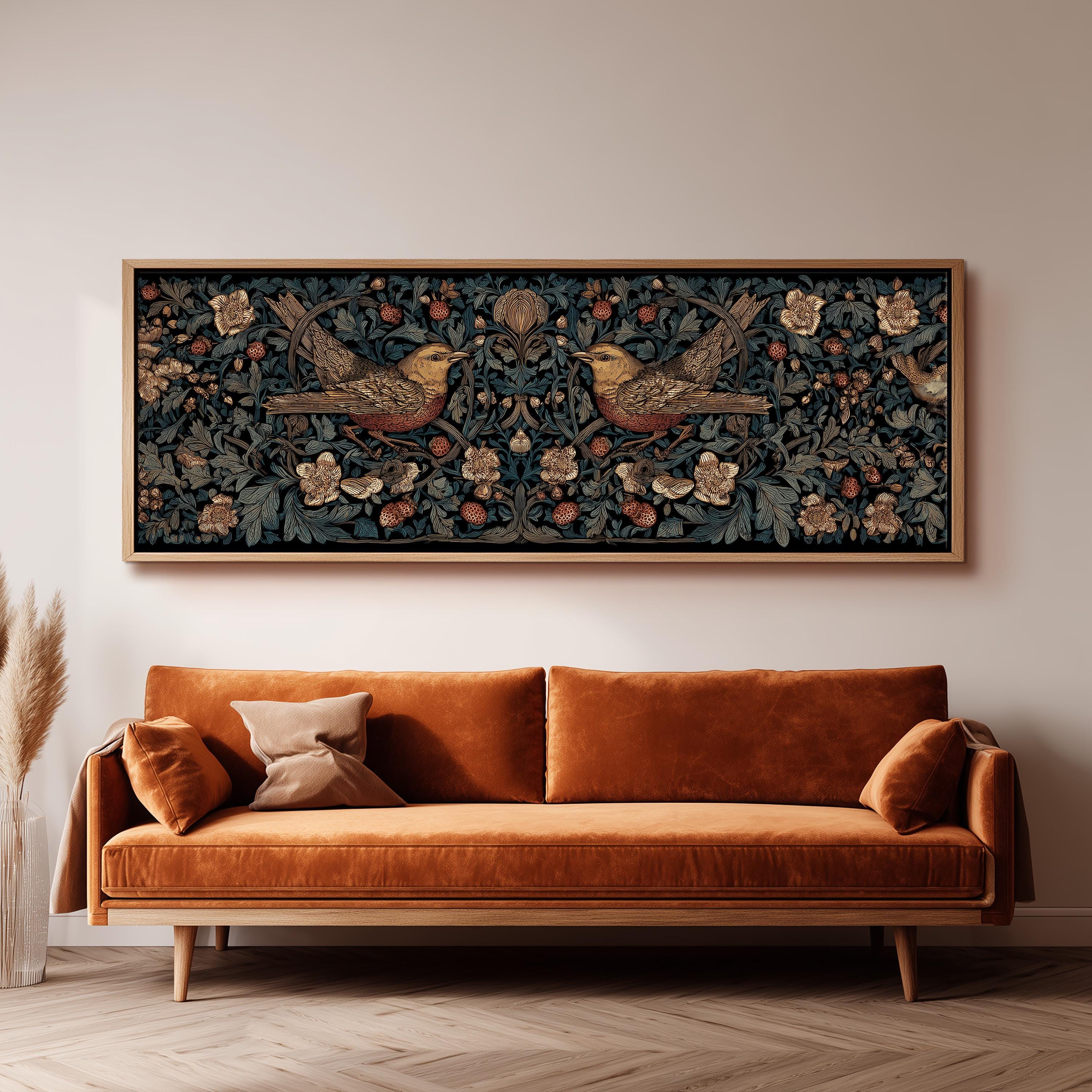 a large, ornate tapestry hanging on a wall above a brown sofa with a wooden frame.