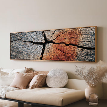 Copper cracked wood grain long horizontal canvas print above a sofa in a living room