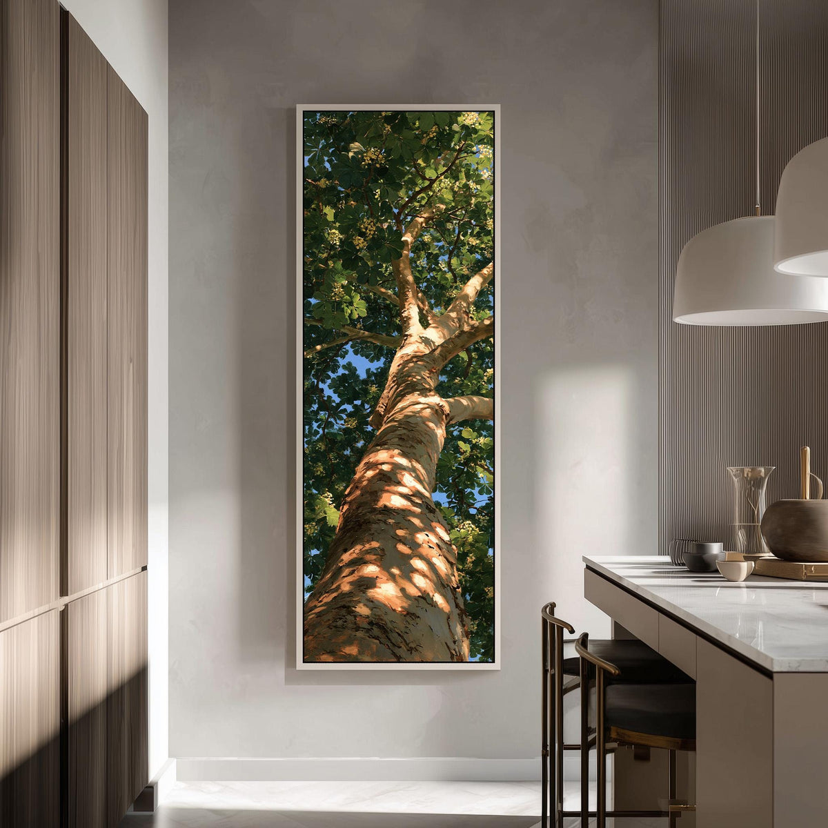 Sunlit tree trunk and summer canopy tall skinny canvas print in a modern kitchen