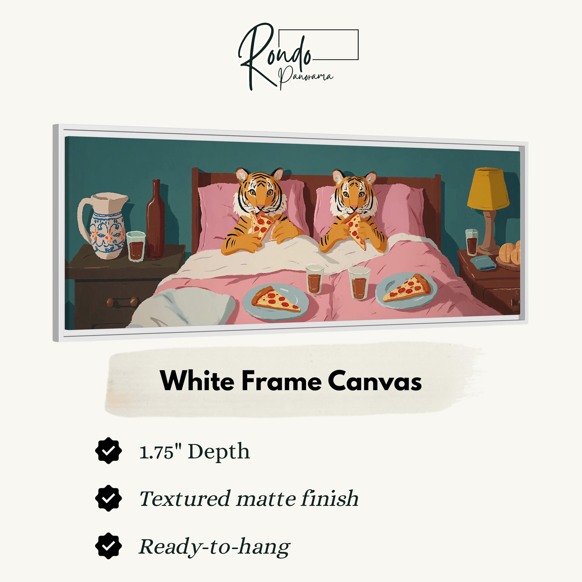 The image is a white frame canvas depicting two tiger-like creatures sitting on a bed, enjoying pizza. The canvas has a 1.75" depth and is textured with a matte finish. It is ready to hang.